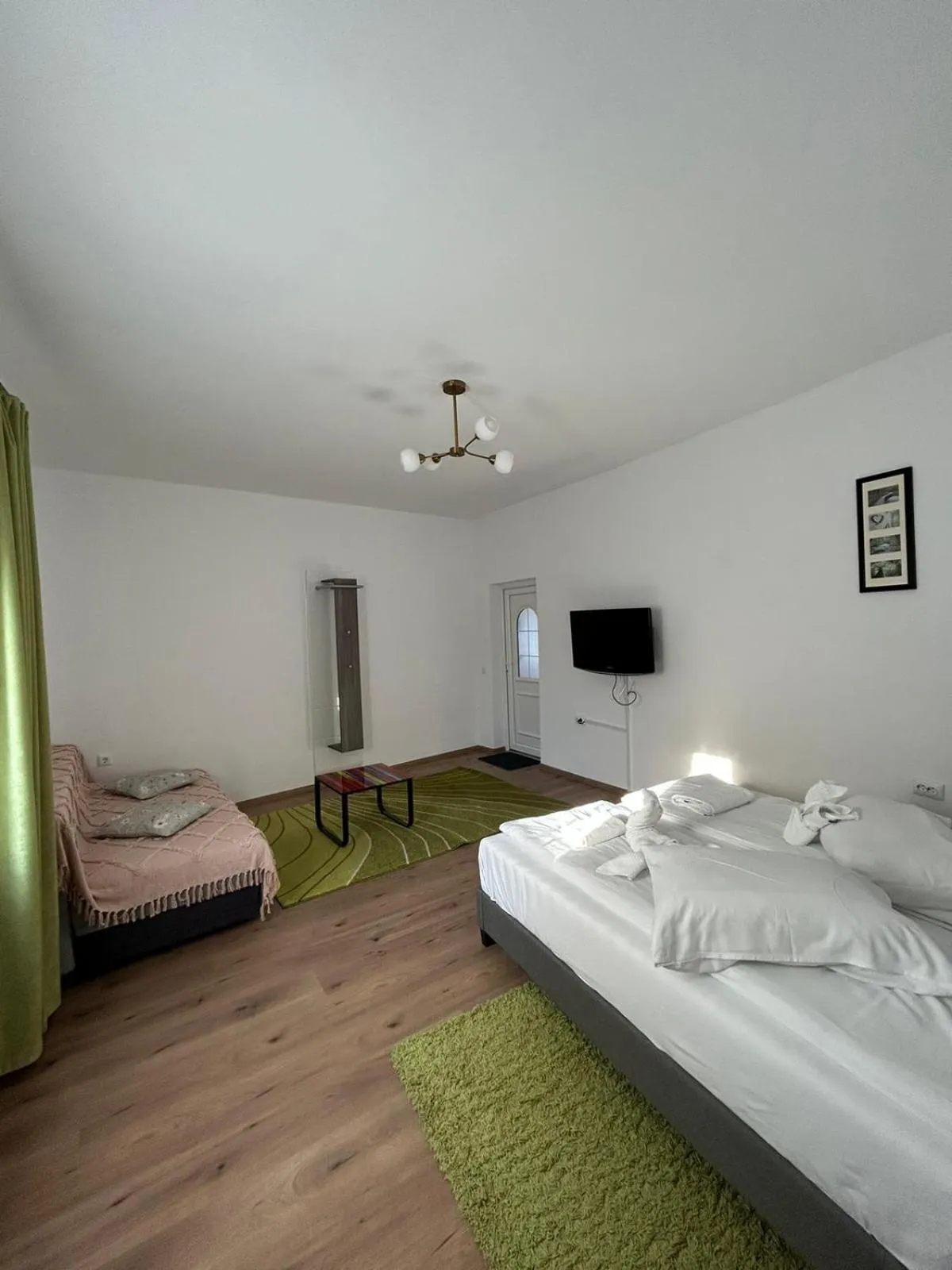 Bed in Pensiunea Joker