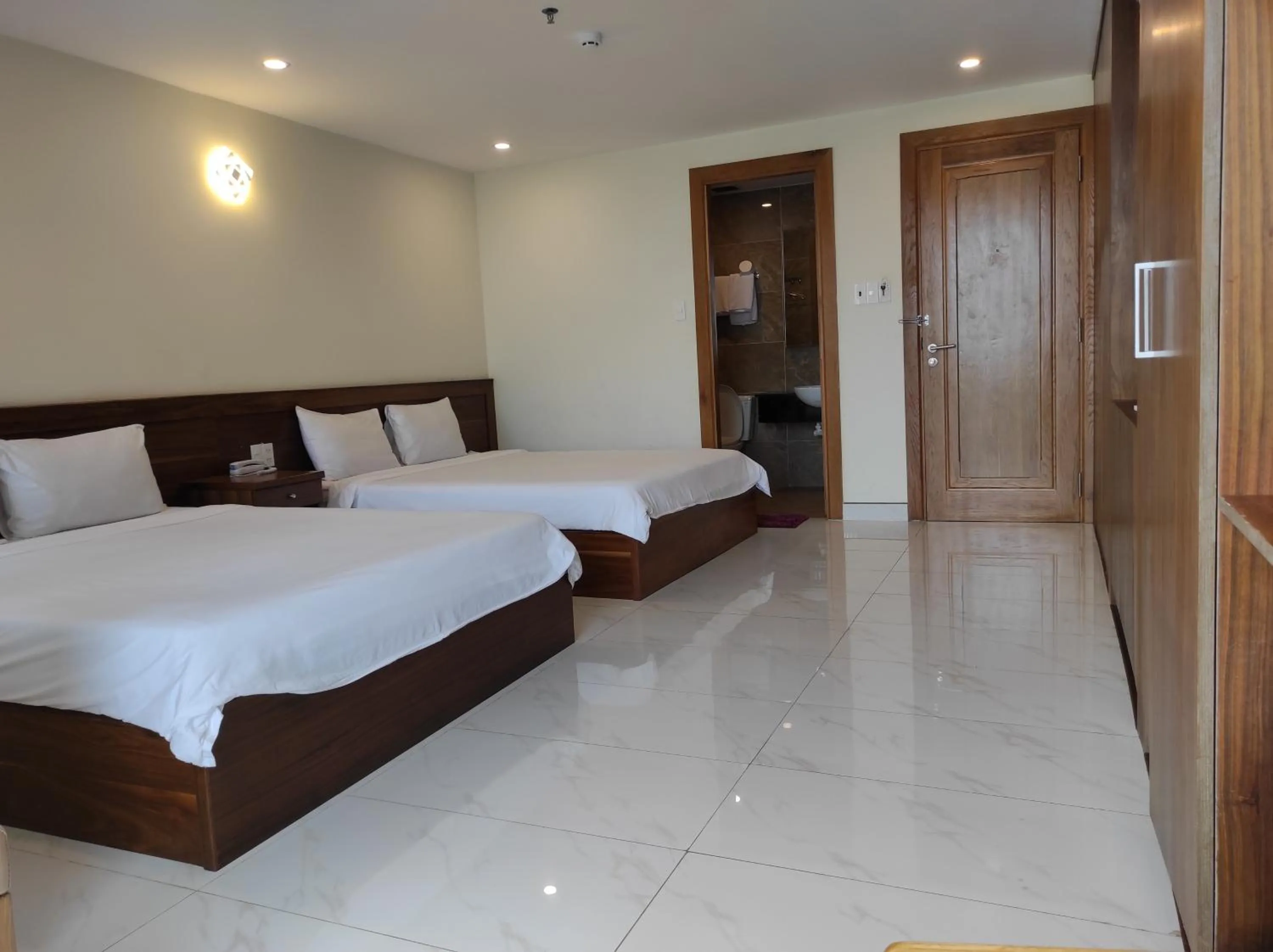 Photo of the whole room, Bed in HỒNG HẢI 2 HOTEL