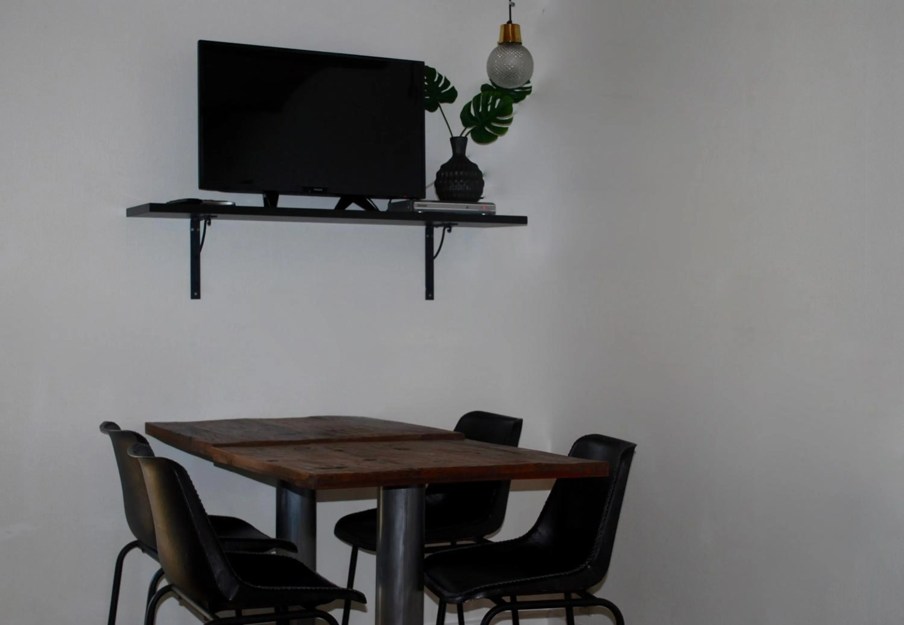 Dining area in Adventure Park Apartments
