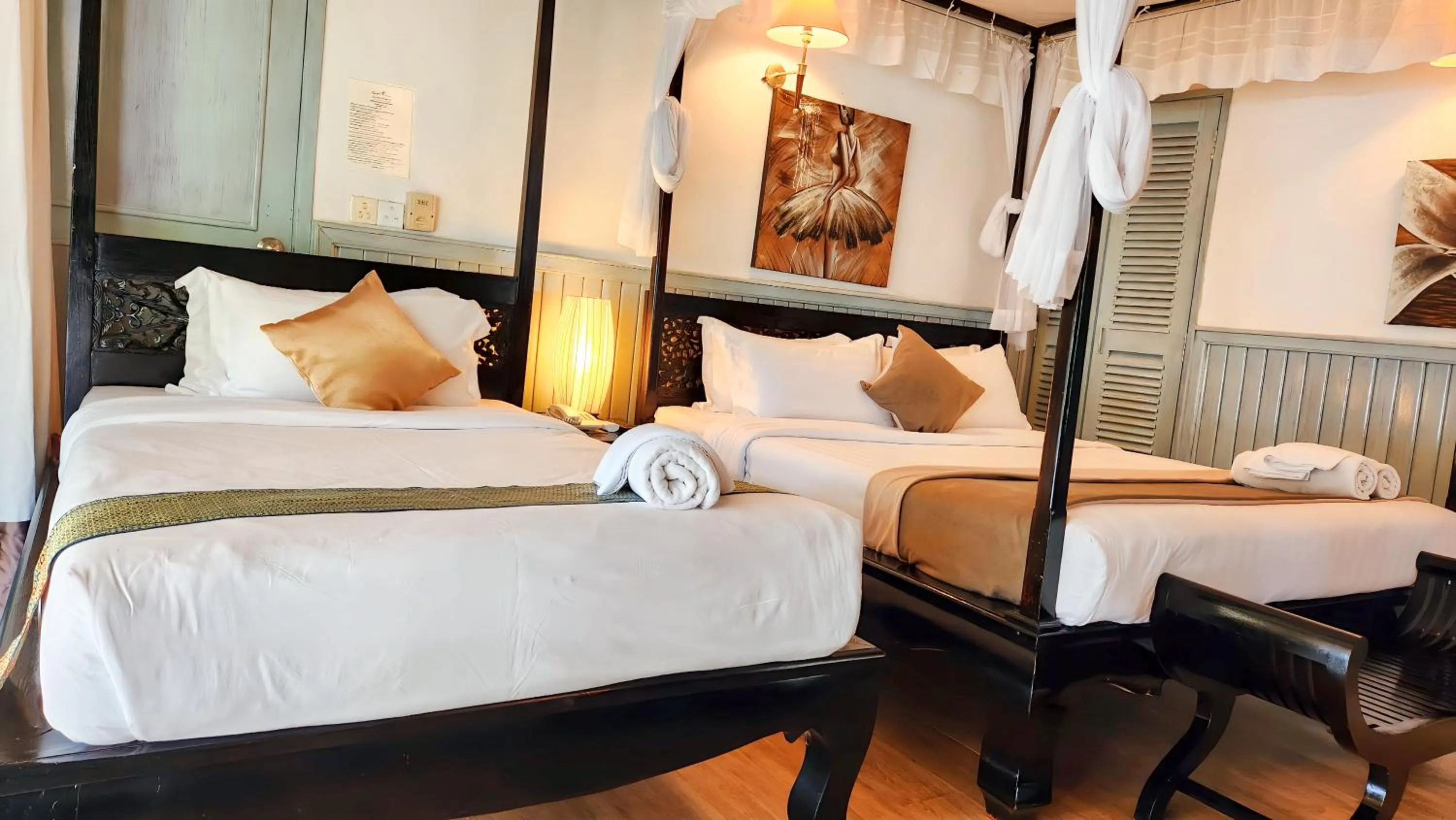 Bedroom, Bed in Nataya Round House Coral Bay Resort