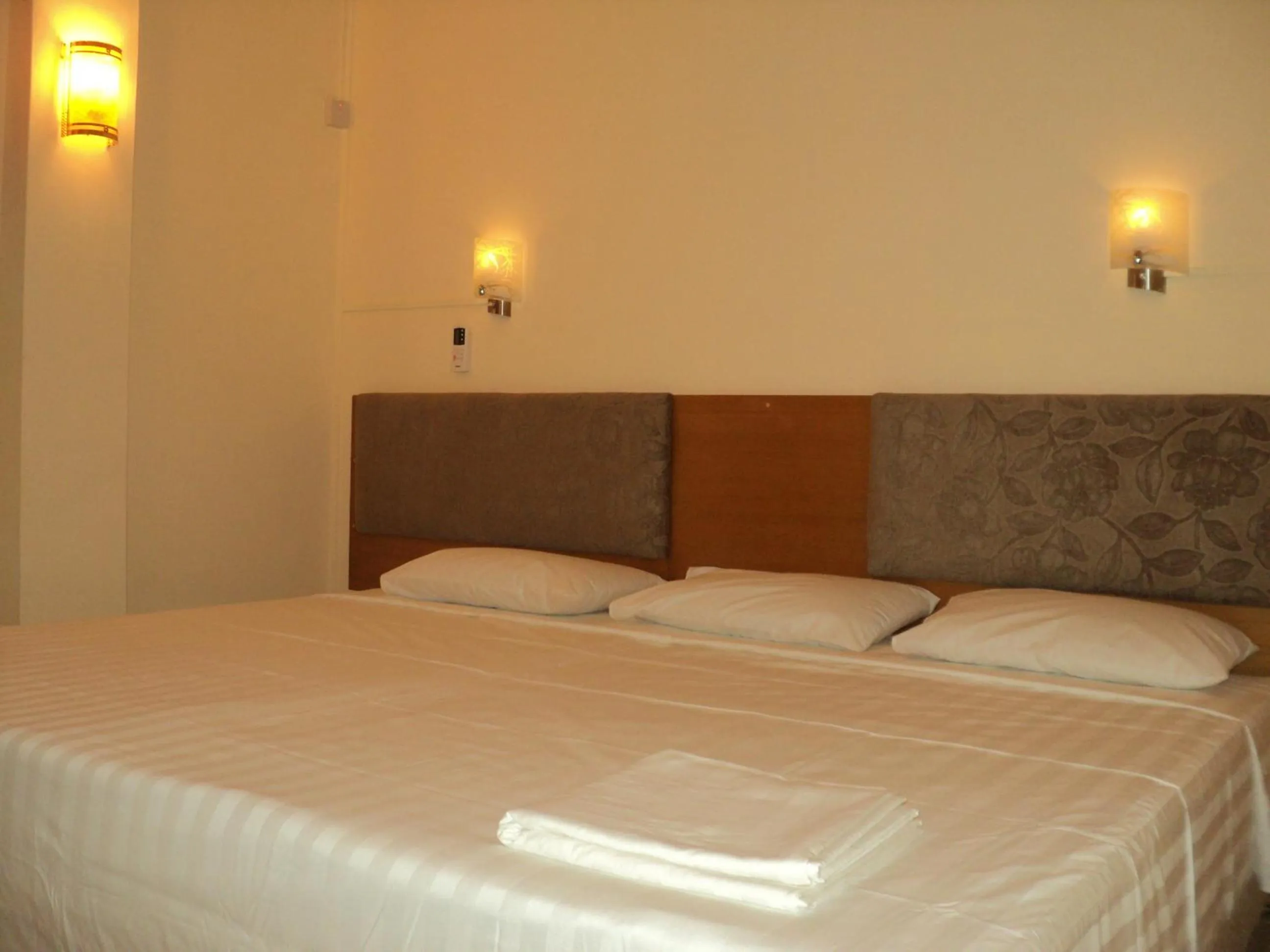 Bed in Monalysa St Honore Apartment & Studios Grand Bay