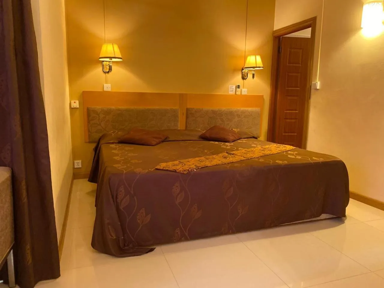 Bed in Monalysa St Honore Apartment & Studios Grand Bay
