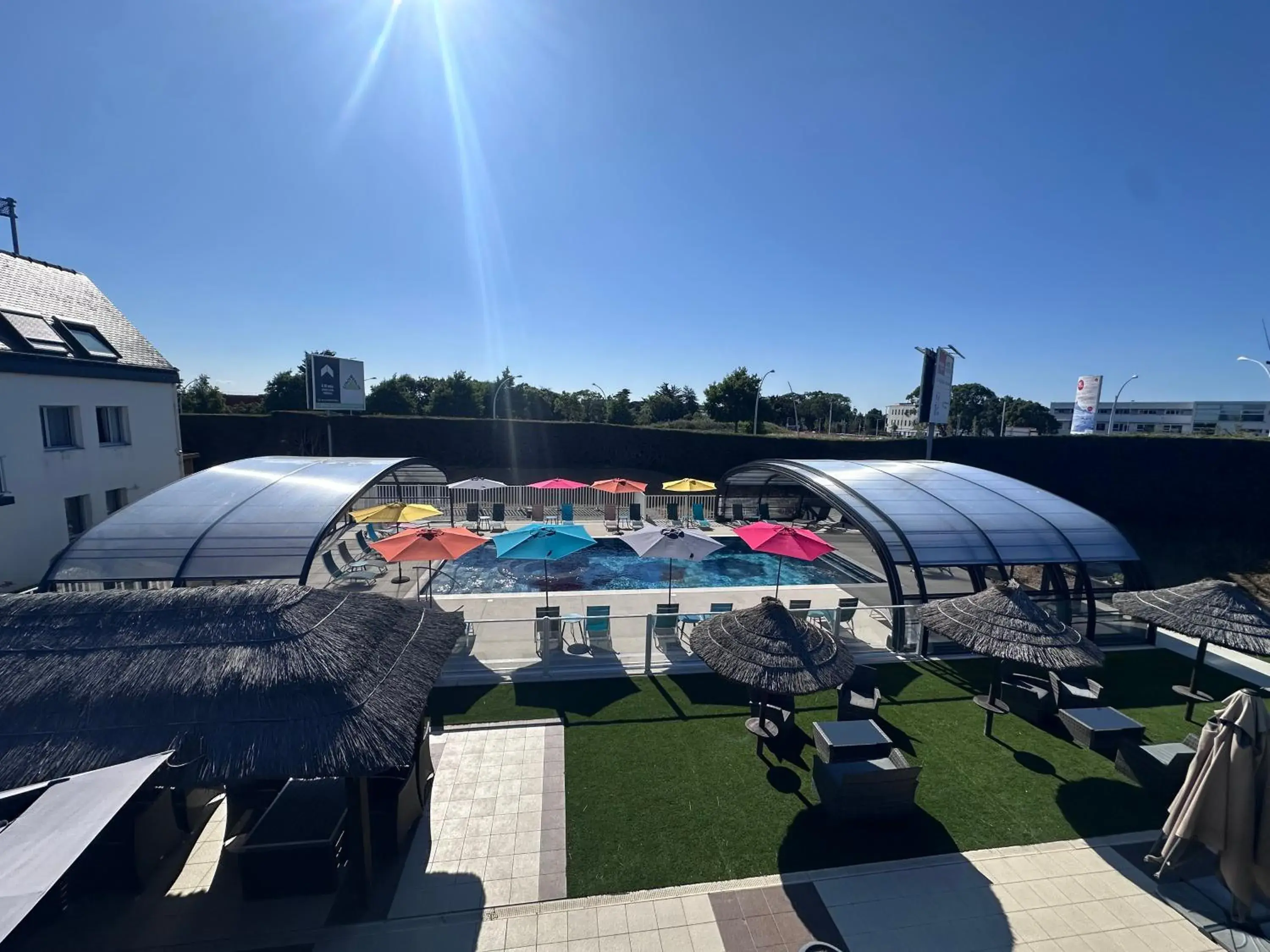 Swimming pool in The Originals Boutique, Hôtel Aquilon, Saint-Nazaire Swimming pool in The Originals Boutique, Hôtel Aquilon, Saint-Nazaire