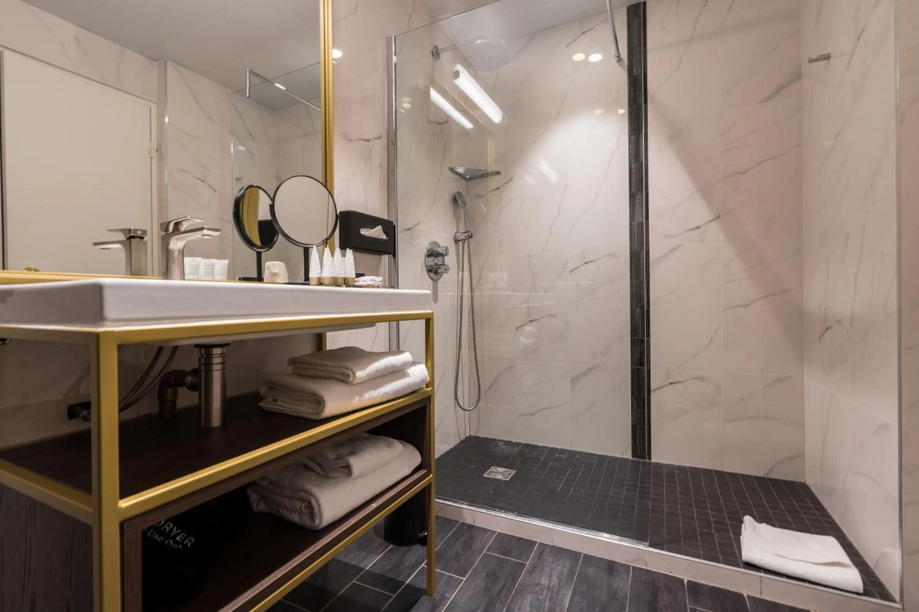 Bathroom, Bed in Aigle Noir Hotel Fontainebleau - MGallery Collection
