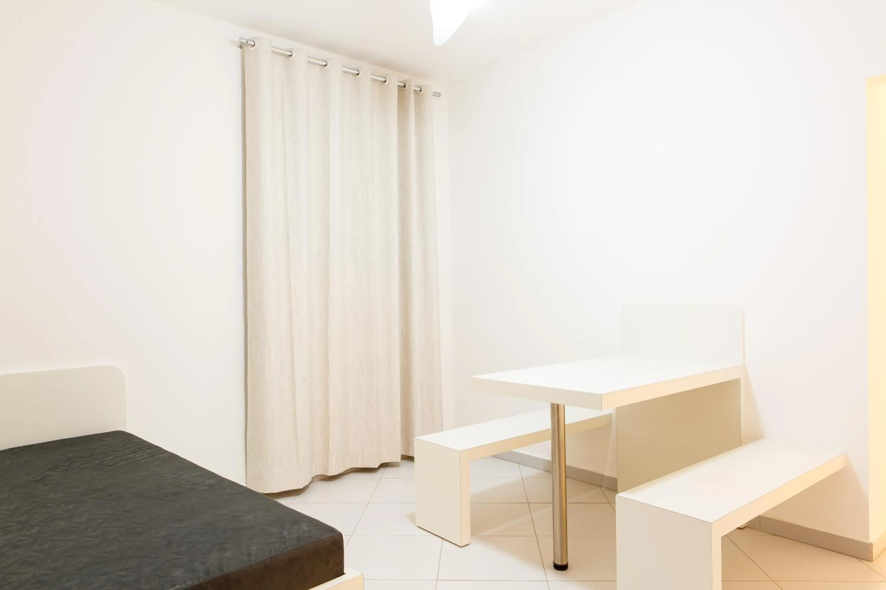 Living room, Bed in Dr. Marinho Apart Hotel