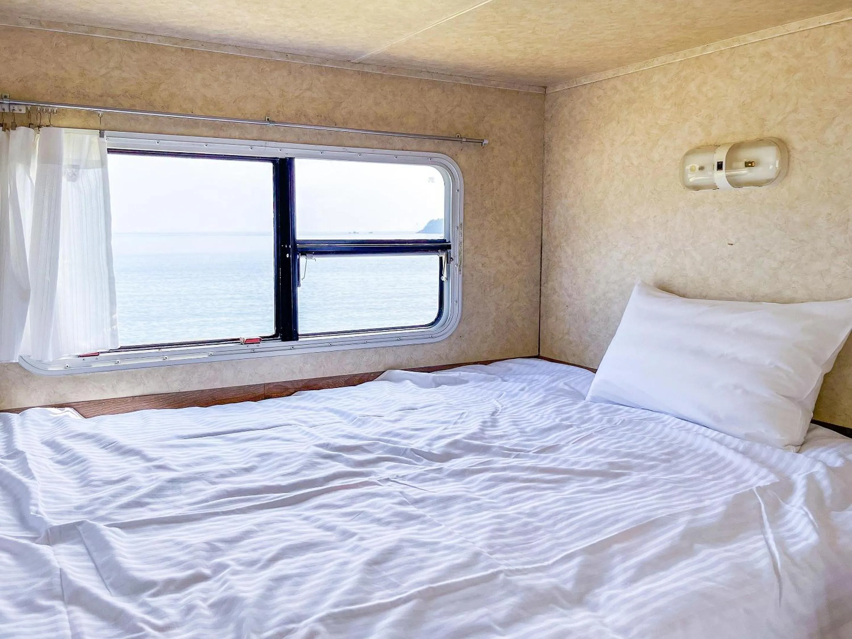 Bed in Sea Tiger Island Inn Shodoshima