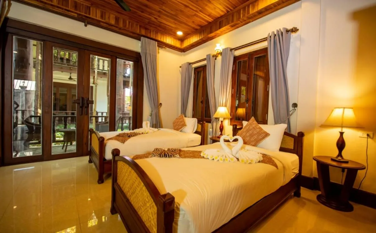 Bed in Treasure Hotel Laos