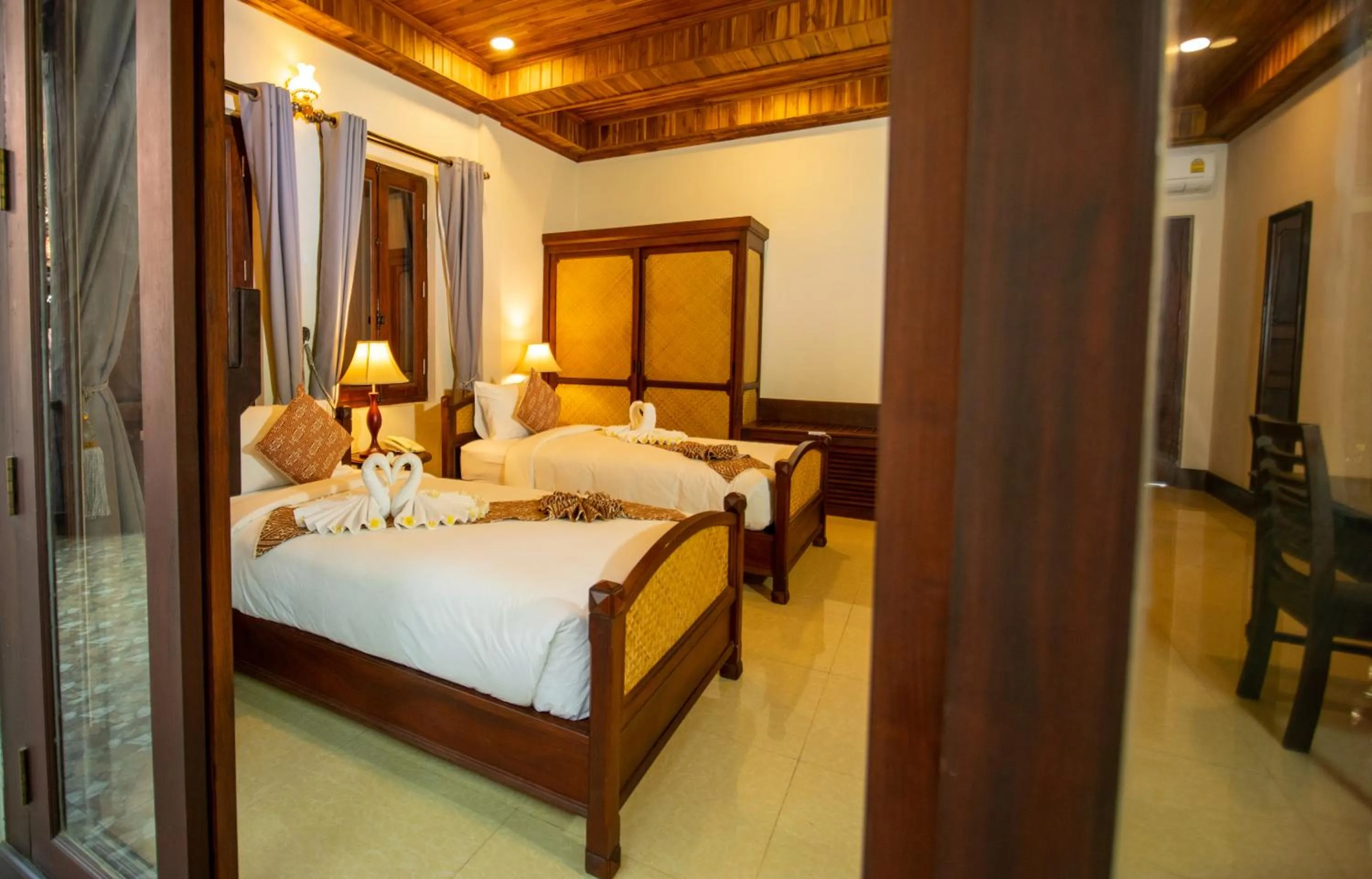 Bedroom, Bed in Treasure Hotel Laos