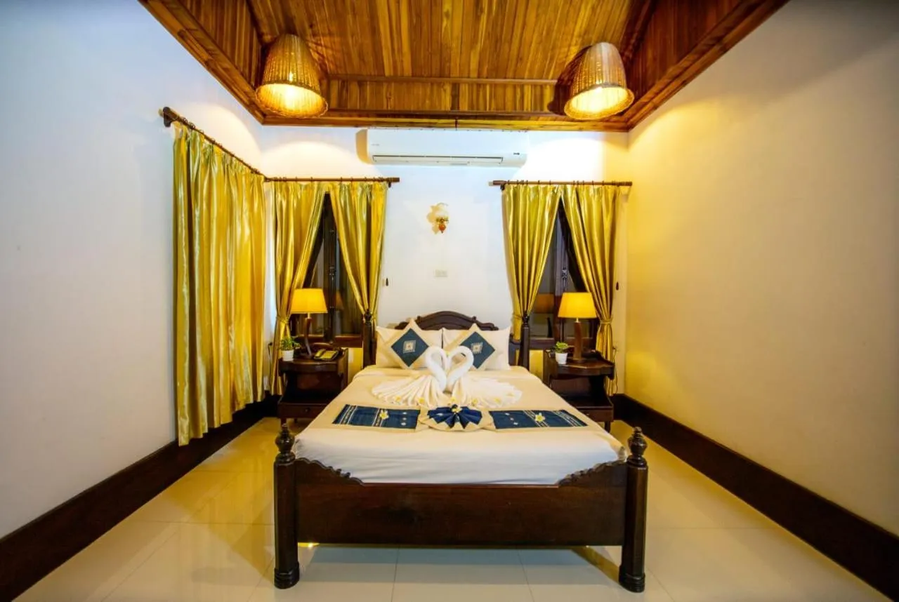 Bed in Treasure Hotel Laos