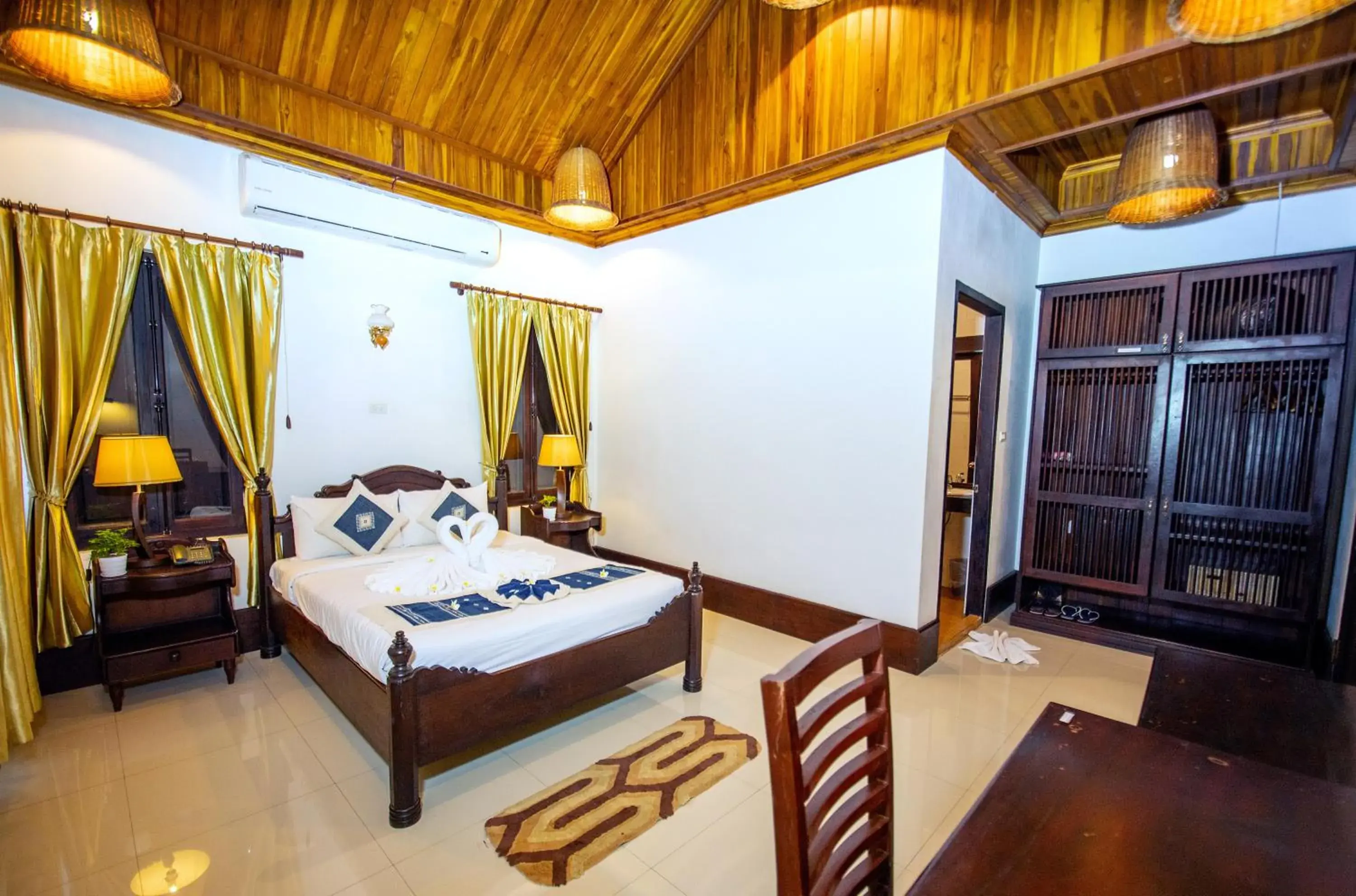 Bedroom, Bed in Treasure Hotel Laos Bedroom, Bed in Treasure Hotel Laos