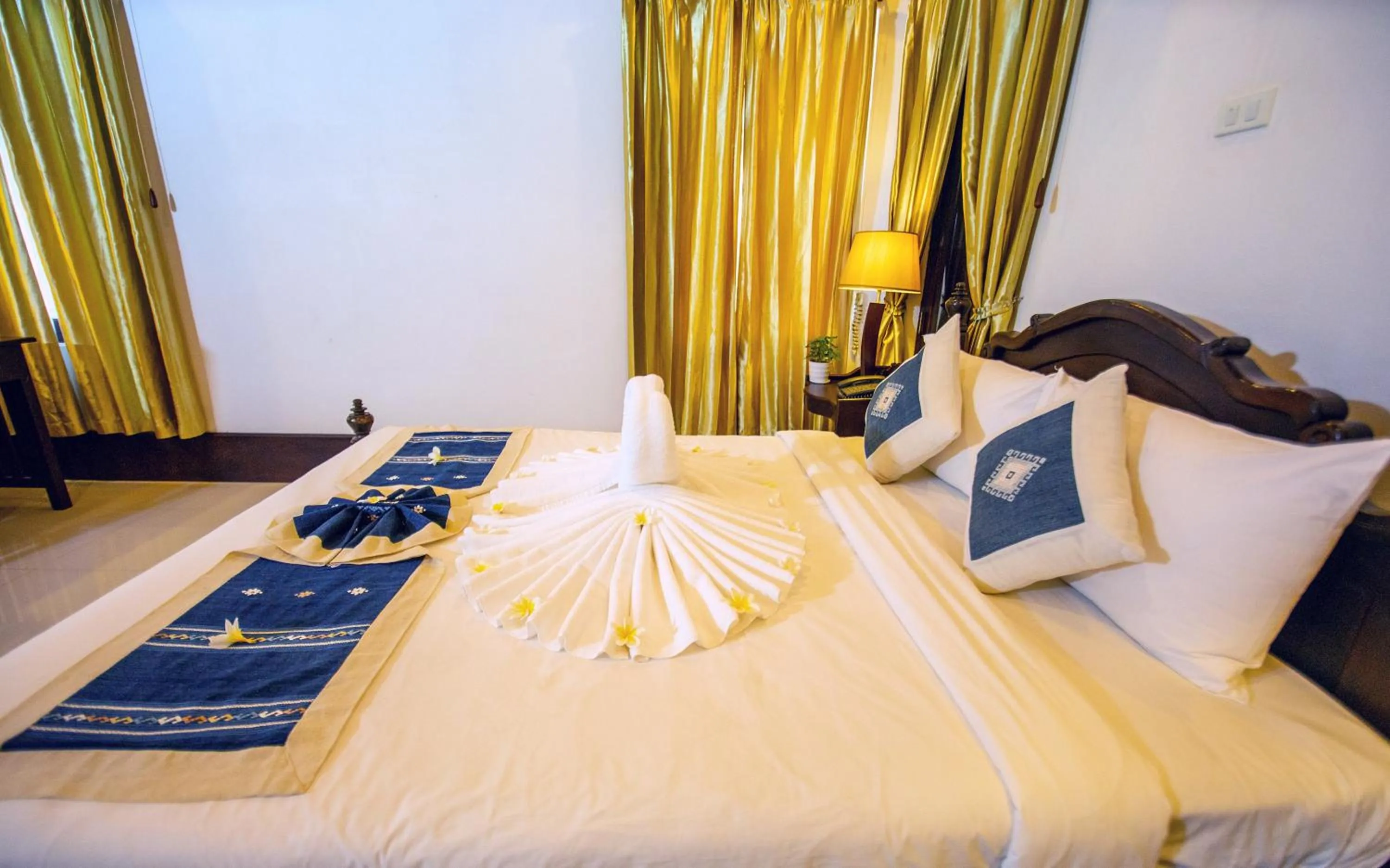 Bedroom, Bed in Treasure Hotel Laos