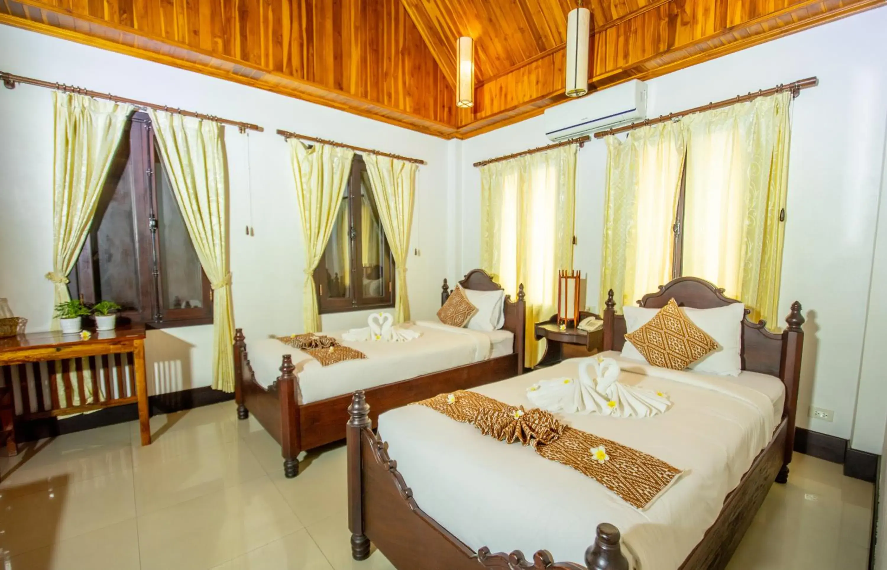 Bedroom, Bed in Treasure Hotel Laos Bedroom, Bed in Treasure Hotel Laos