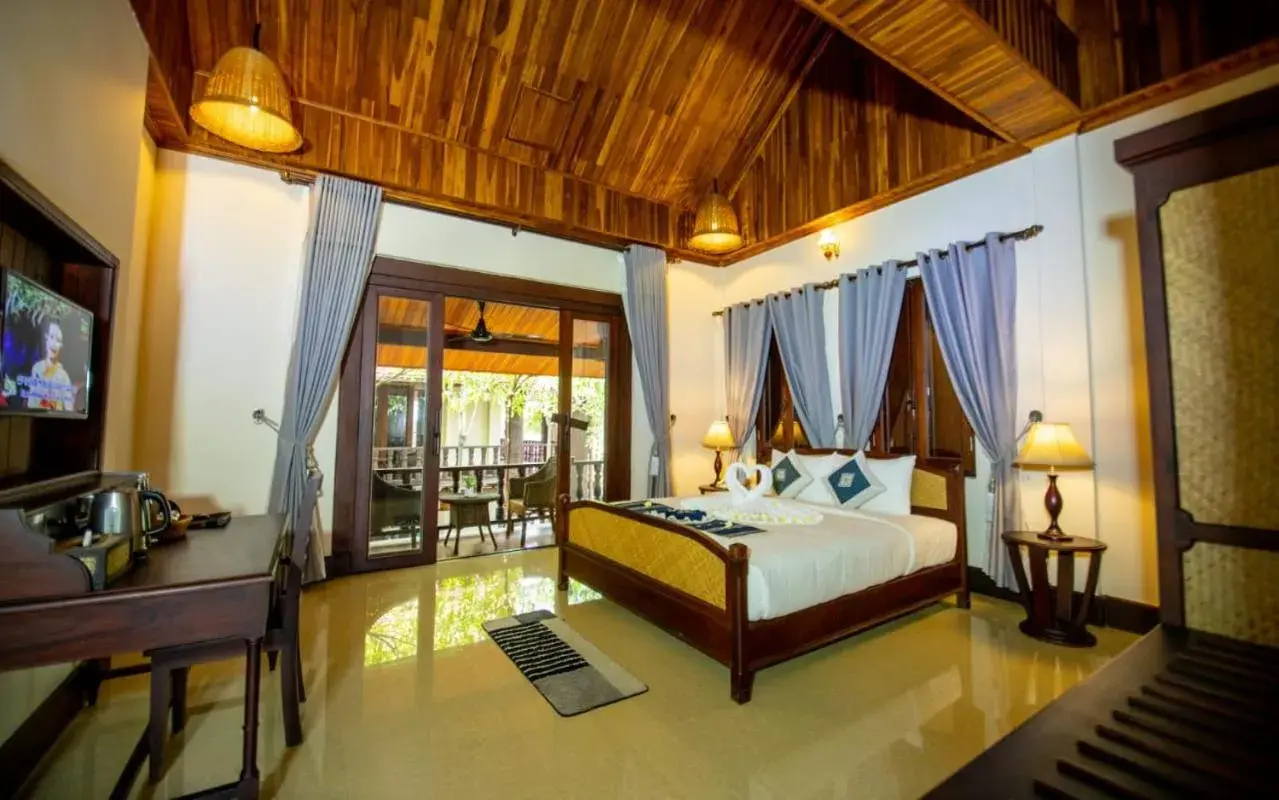 Bed in Treasure Hotel Laos Bed in Treasure Hotel Laos
