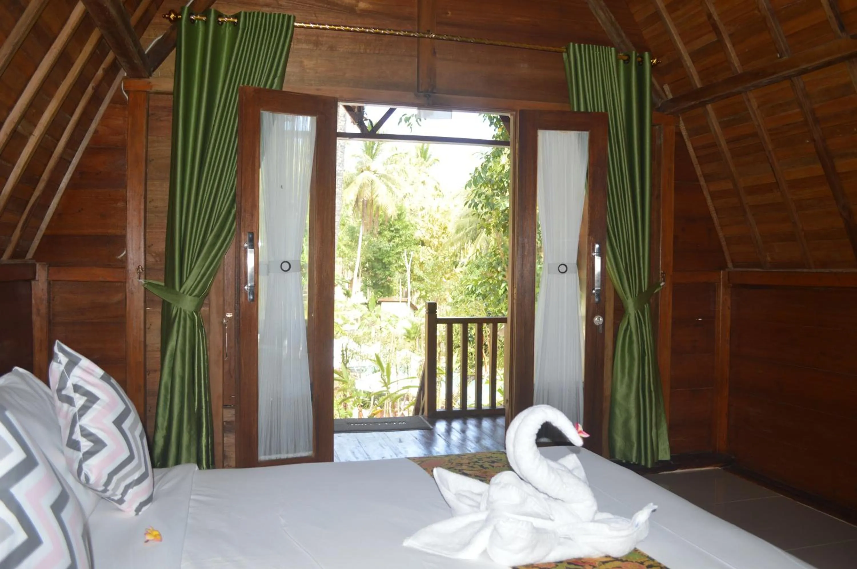 Bed in Nyuh Gading Bungalow Nusa Penida