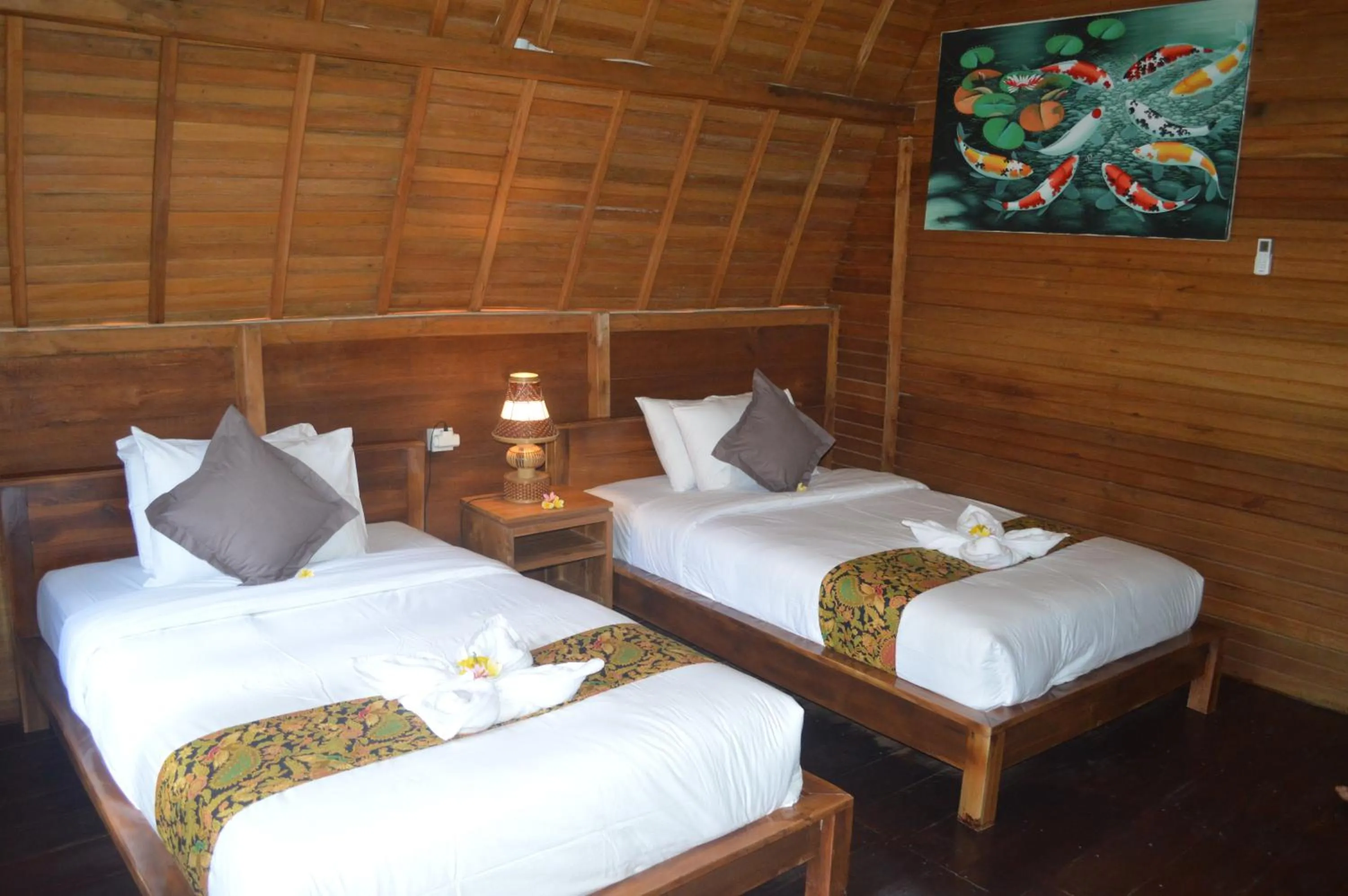 Bed in Nyuh Gading Bungalow Nusa Penida