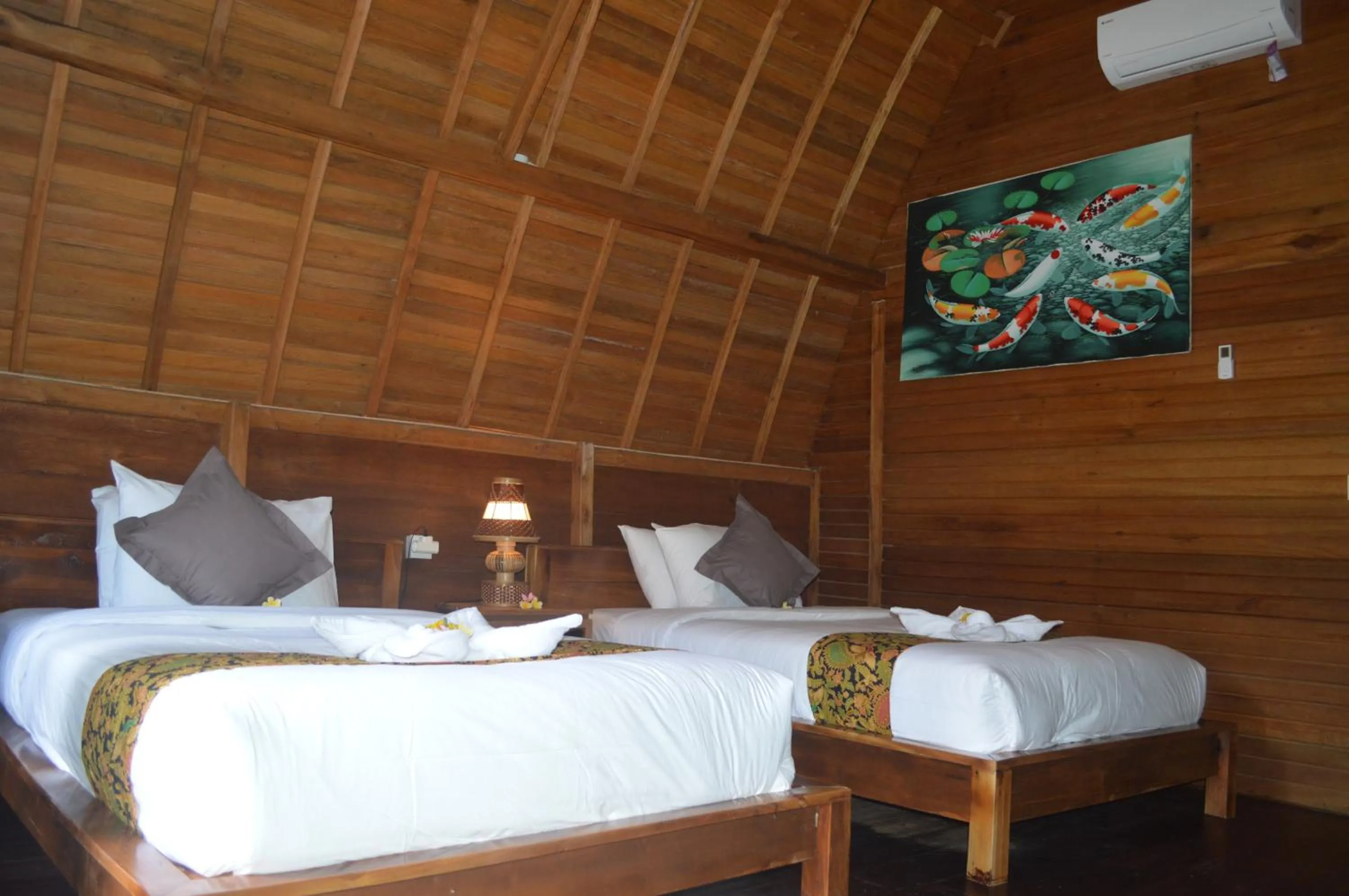 Bed in Nyuh Gading Bungalow Nusa Penida