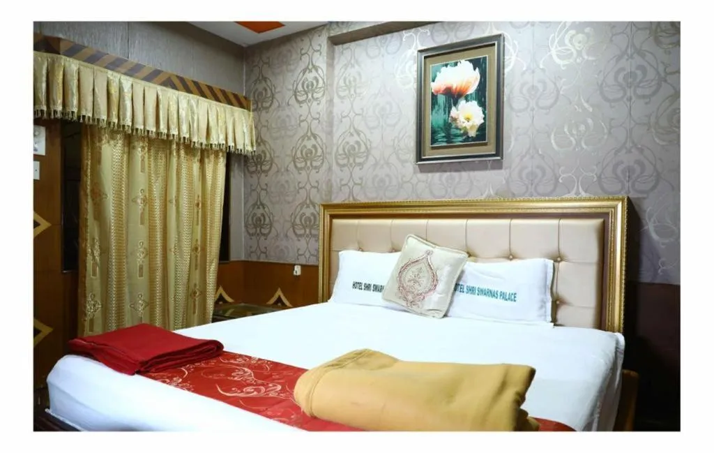 Bed in Hotel Shri Swarna's Palace - A Business Class Hotel