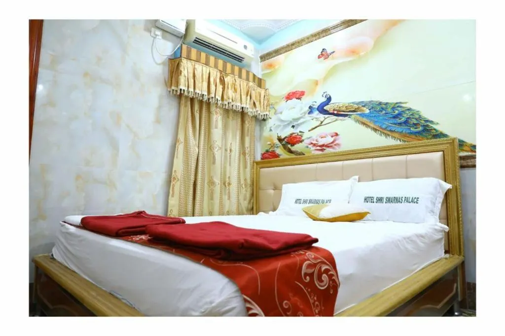 Bed in Hotel Shri Swarna's Palace - A Business Class Hotel
