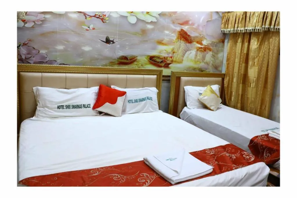 Bed in Hotel Shri Swarna's Palace - A Business Class Hotel