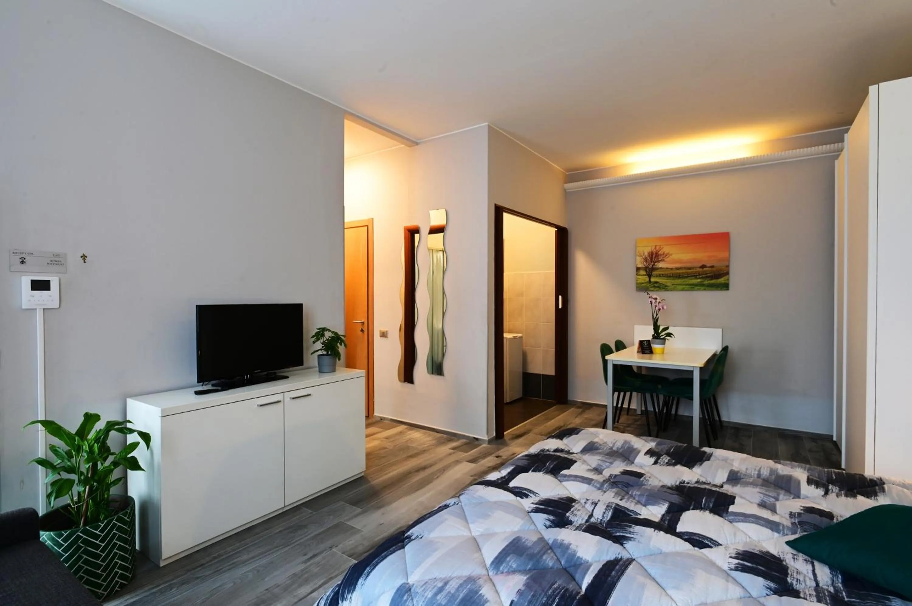 Communal lounge/ TV room, Bed in Holiday Homes Aparthotel Milano