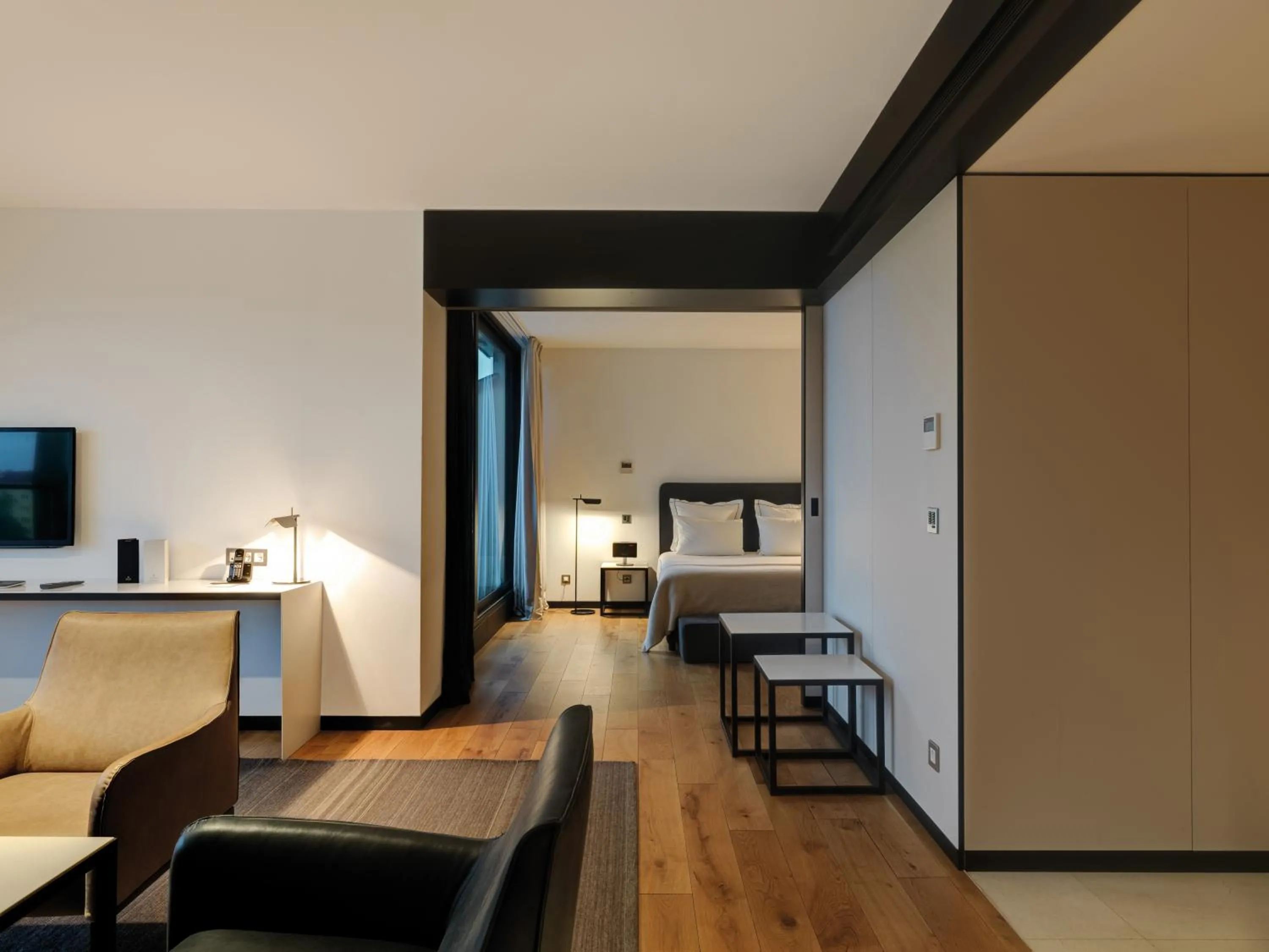 Living room, Bed in Sense Hotel Sofia, a Member of Design Hotels