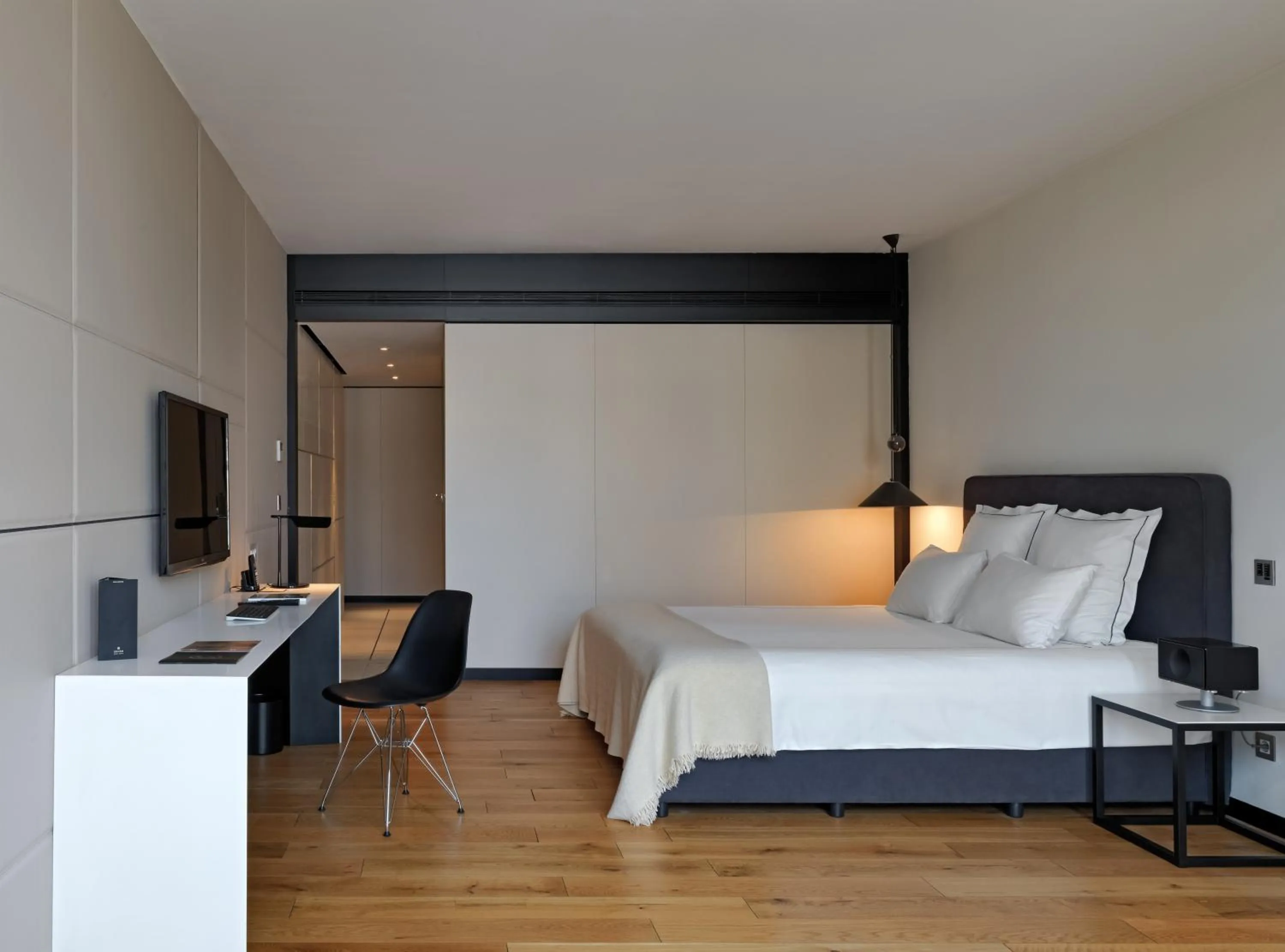 Living room, Bed in Sense Hotel Sofia, a Member of Design Hotels