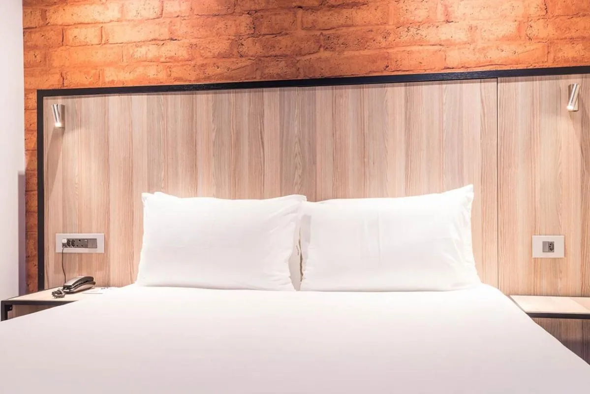 Bed in ONOMO Hotel Maputo