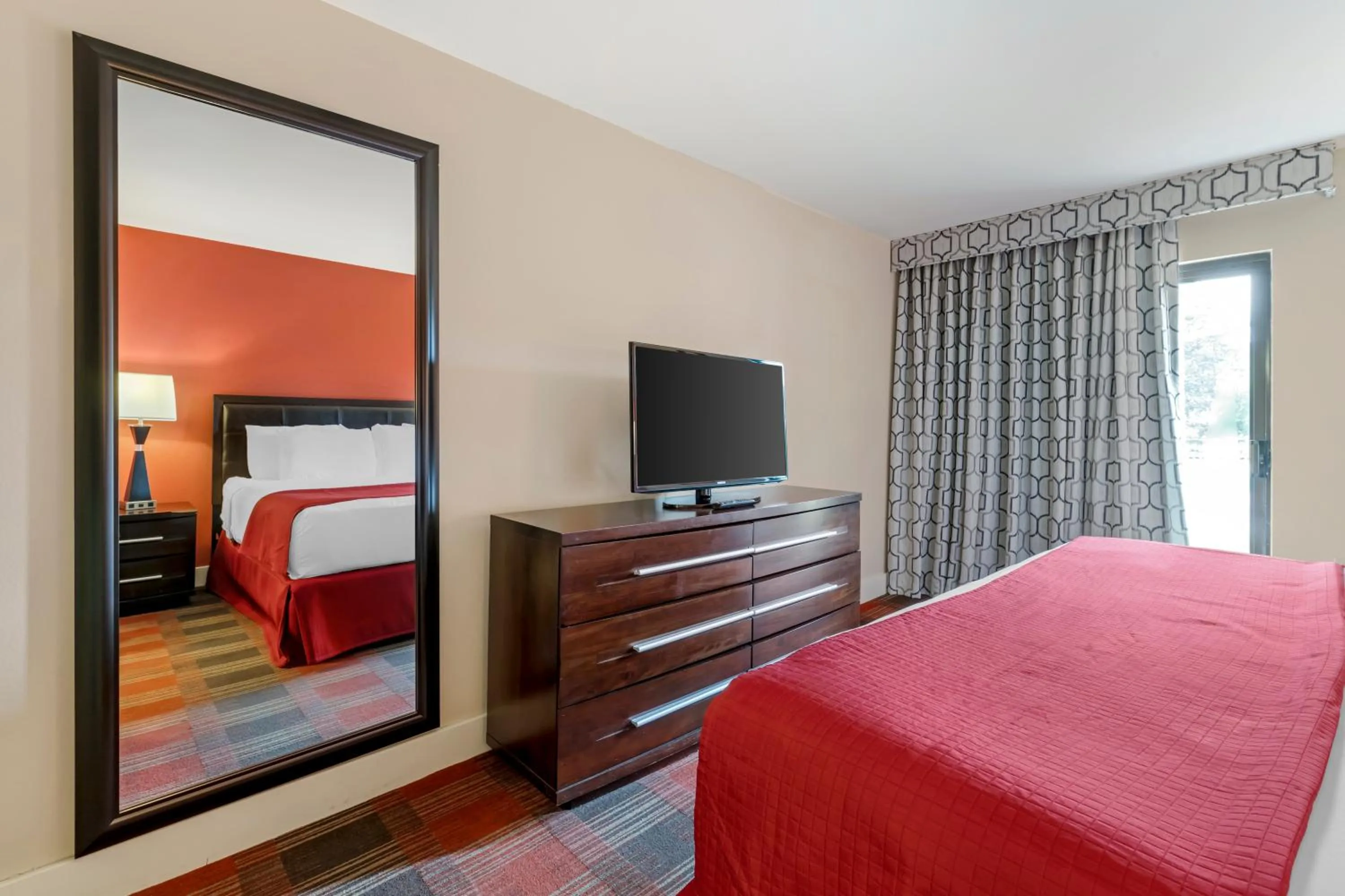 Bedroom in Polynesian Hotel & Suites