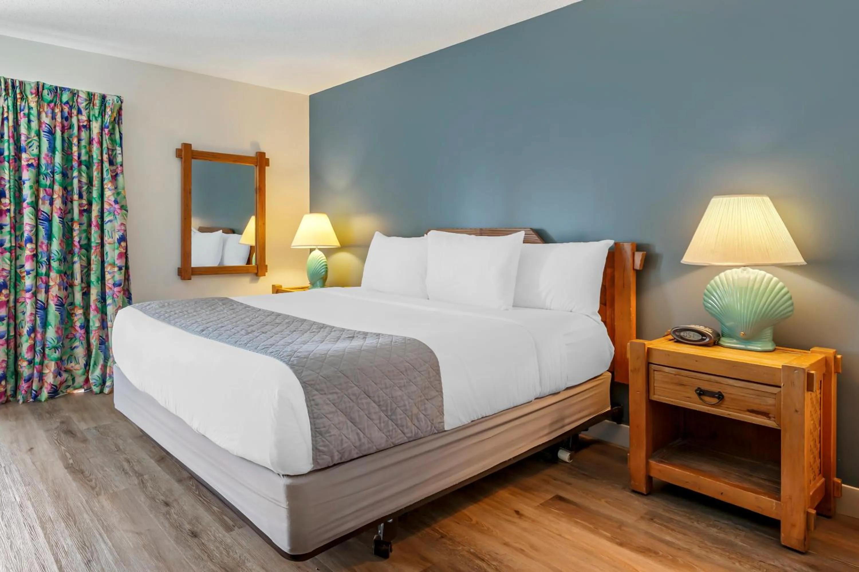 Bedroom in Polynesian Hotel & Suites