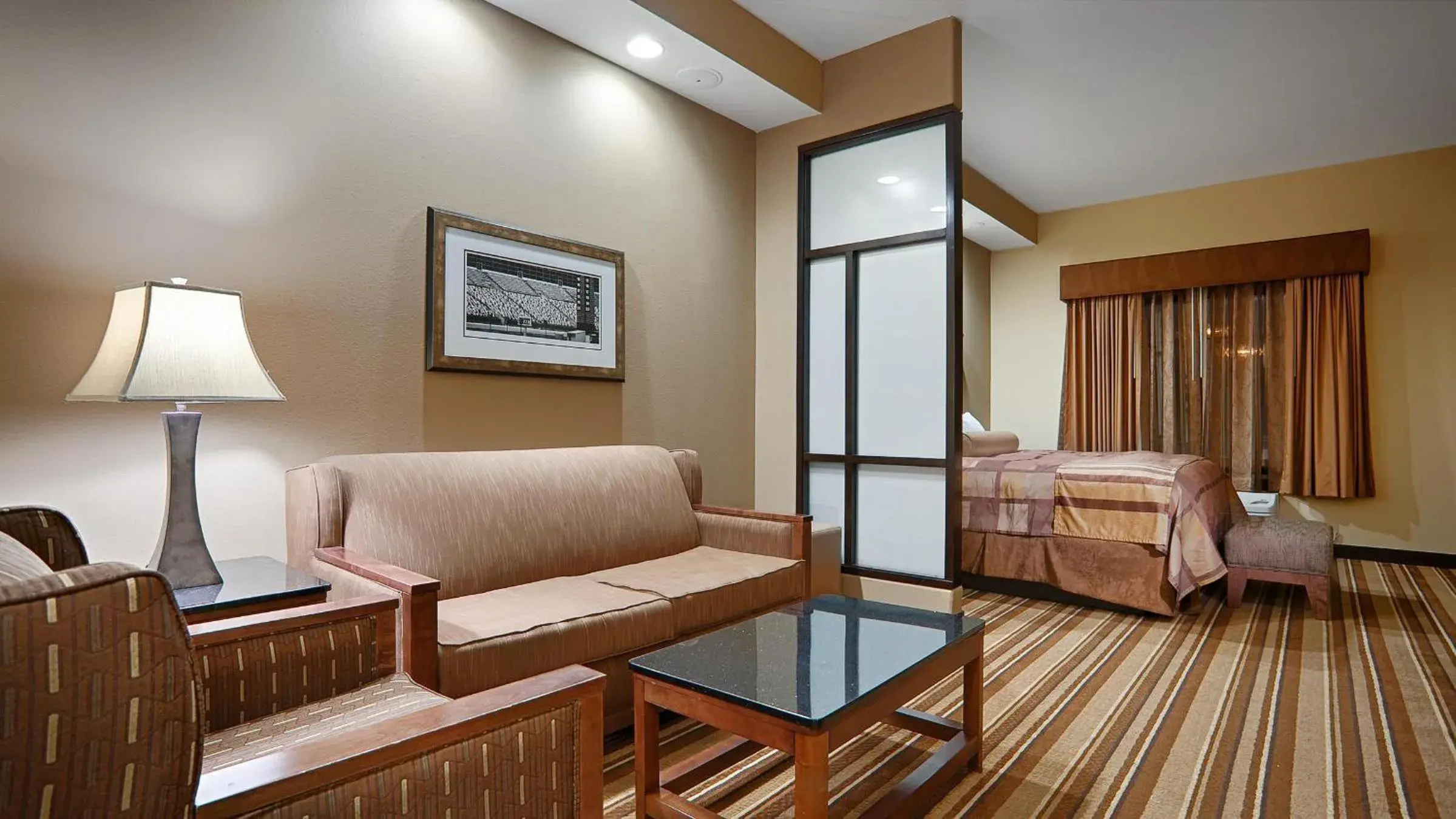 King Suite with Sofa Bed and Roll-In Shower - Mobility Accessible in Best Western Plus KC Speedway Inn & Suites King Suite with Sofa Bed and Roll-In Shower - Mobility Accessible in Best Western Plus KC Speedway Inn & Suites