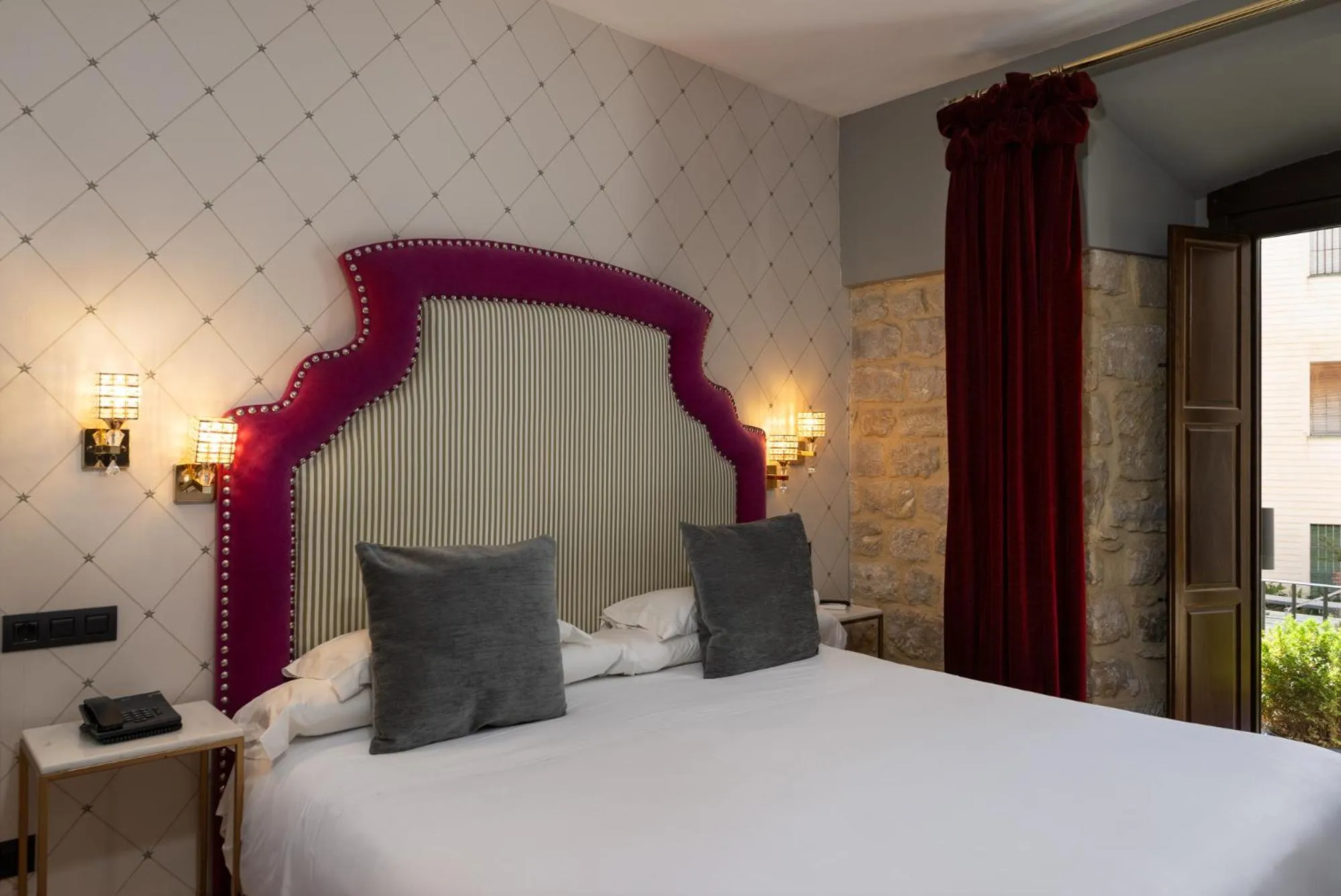 Bed in Hotel Don Juan Boutique