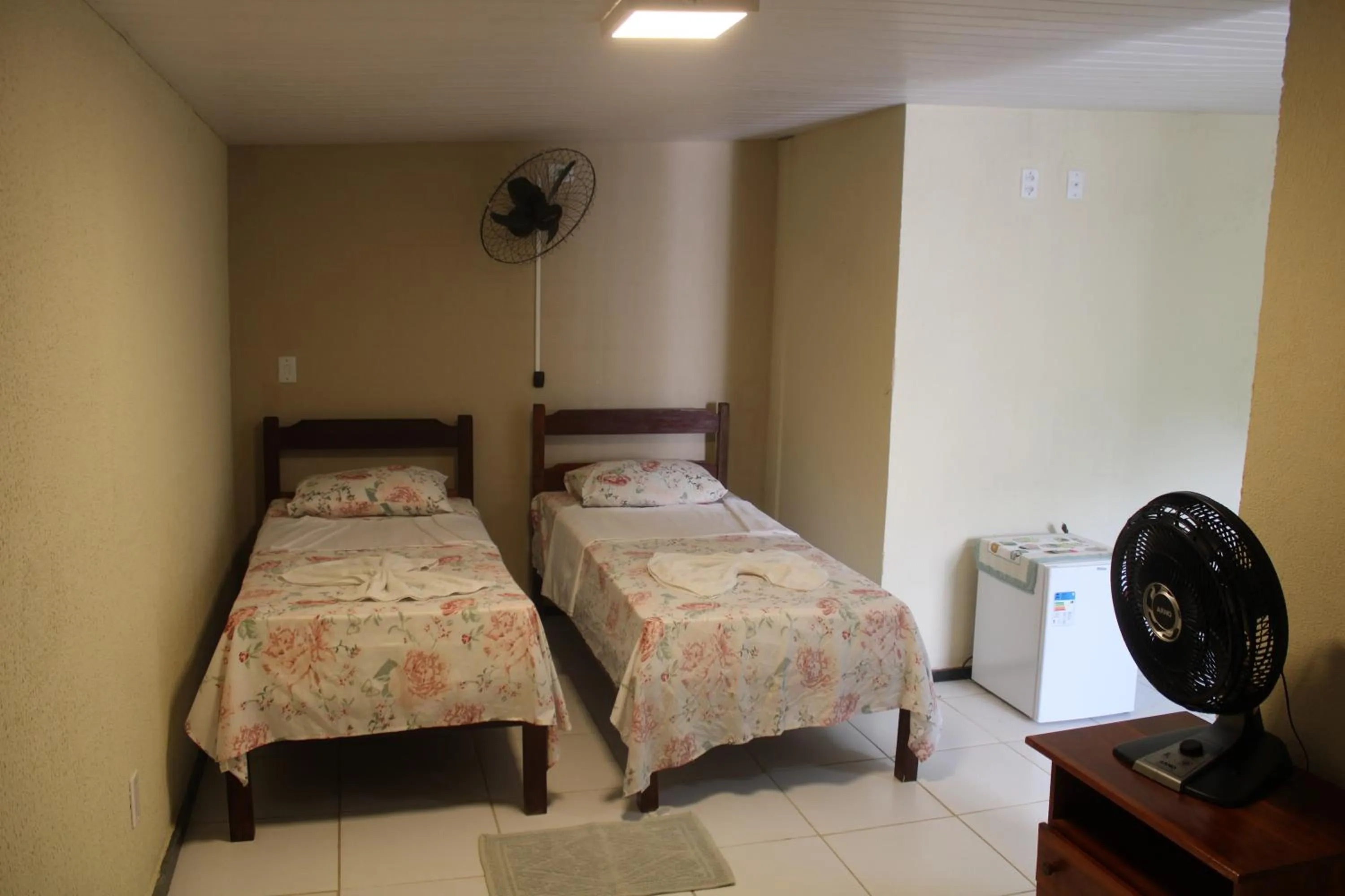 Bed in HOTEL CANTINHO DAS FLORES