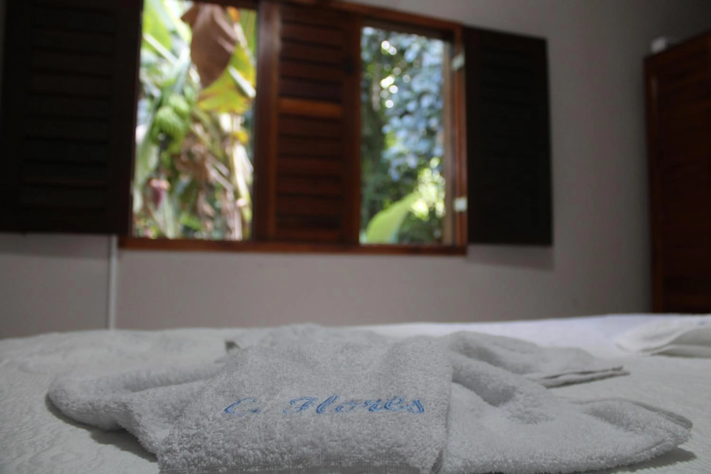 Bed in HOTEL CANTINHO DAS FLORES