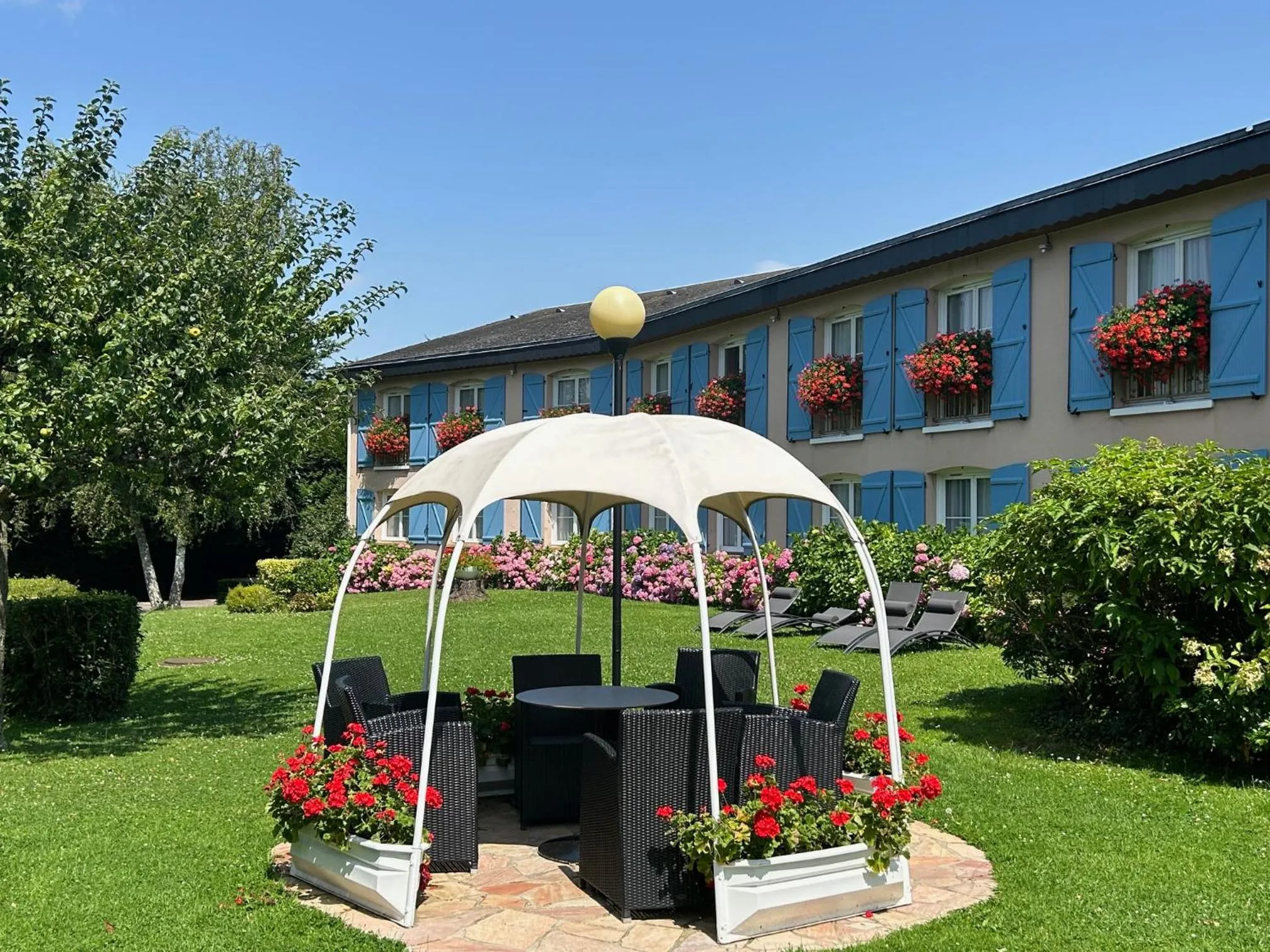 Garden in La Berteliere, The Originals Relais