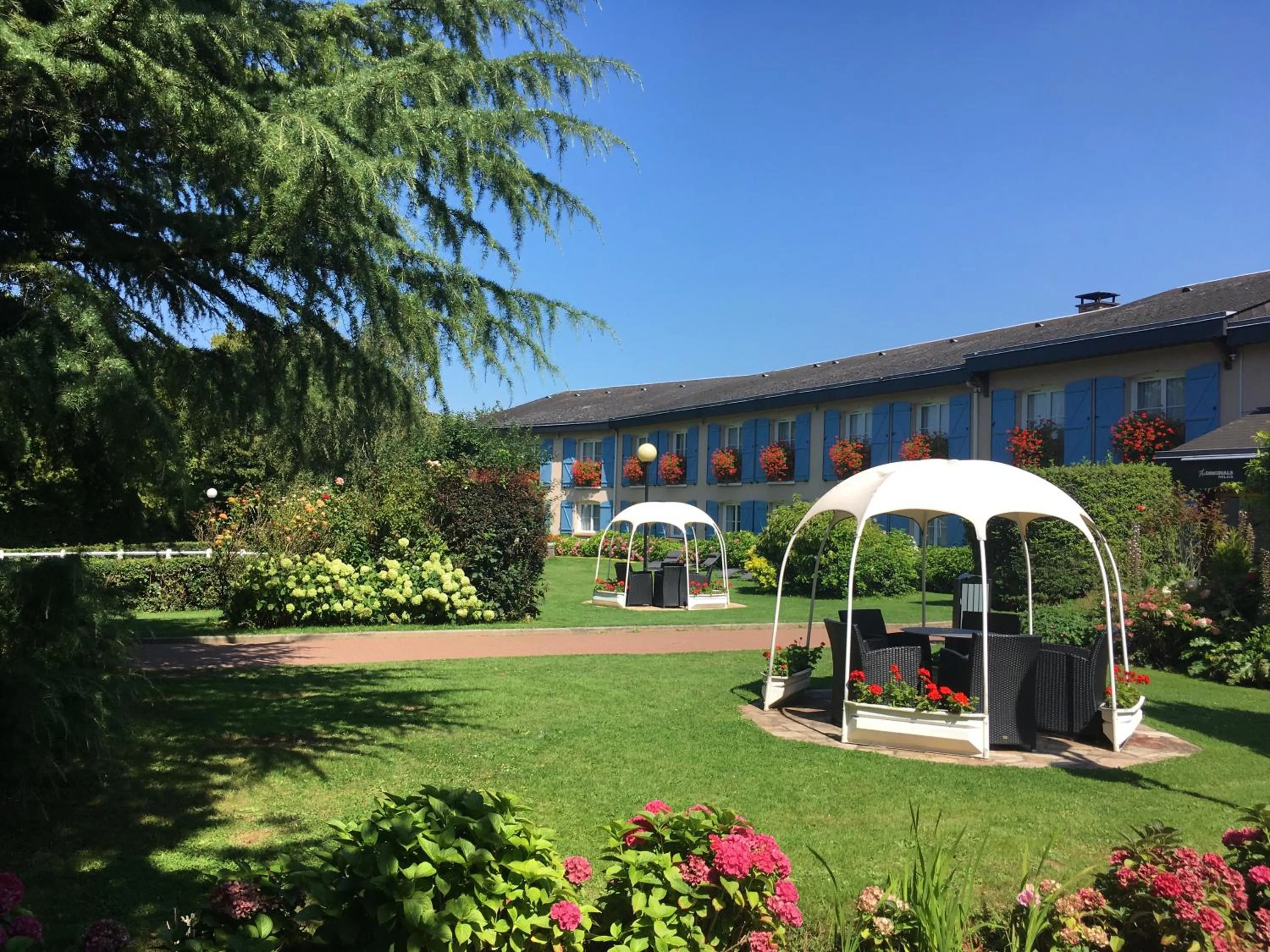 Garden in La Berteliere, The Originals Relais