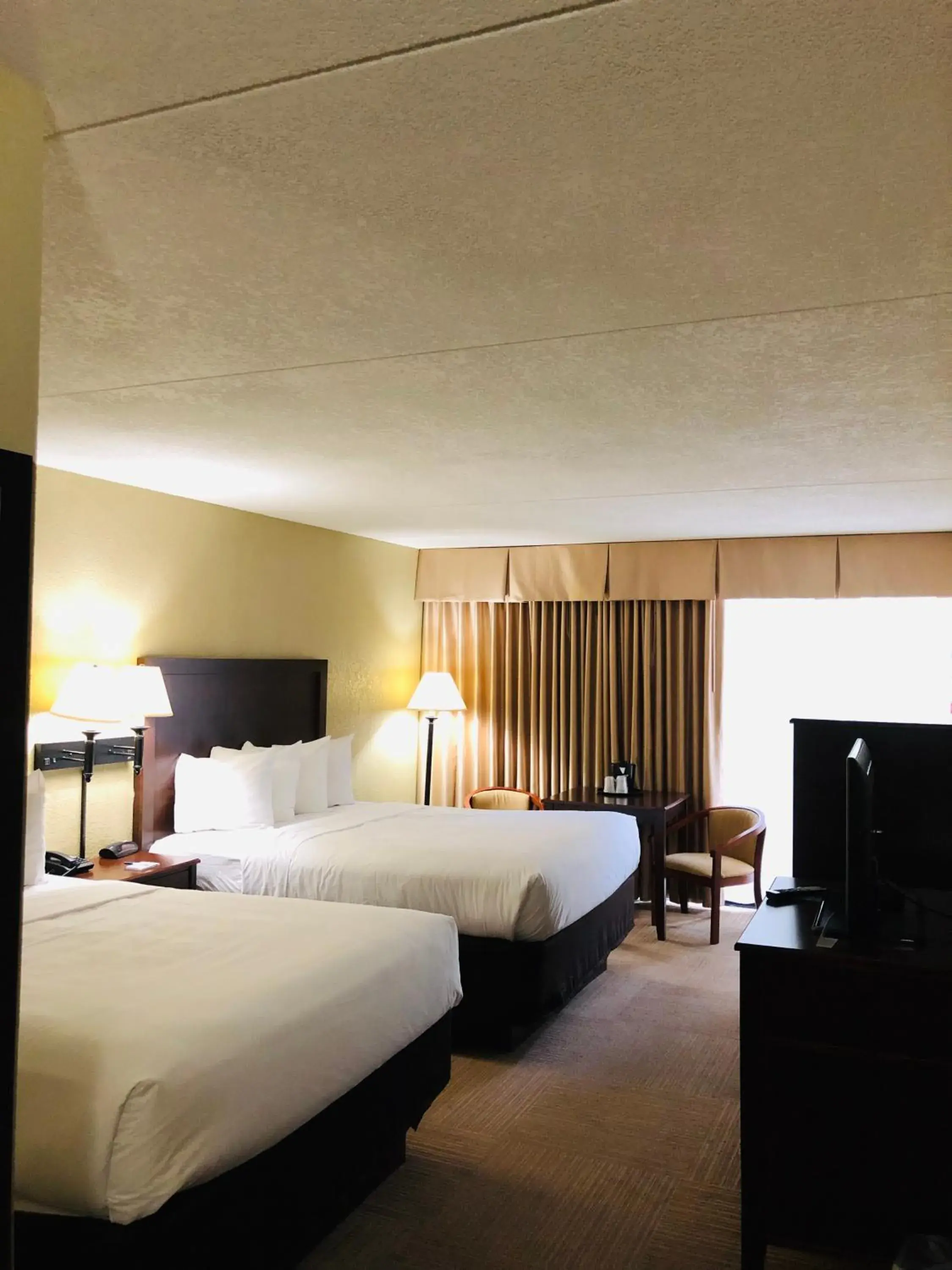 Photo of the whole room, Bed in The Atrium Hotel on Third Photo of the whole room, Bed in The Atrium Hotel on Third