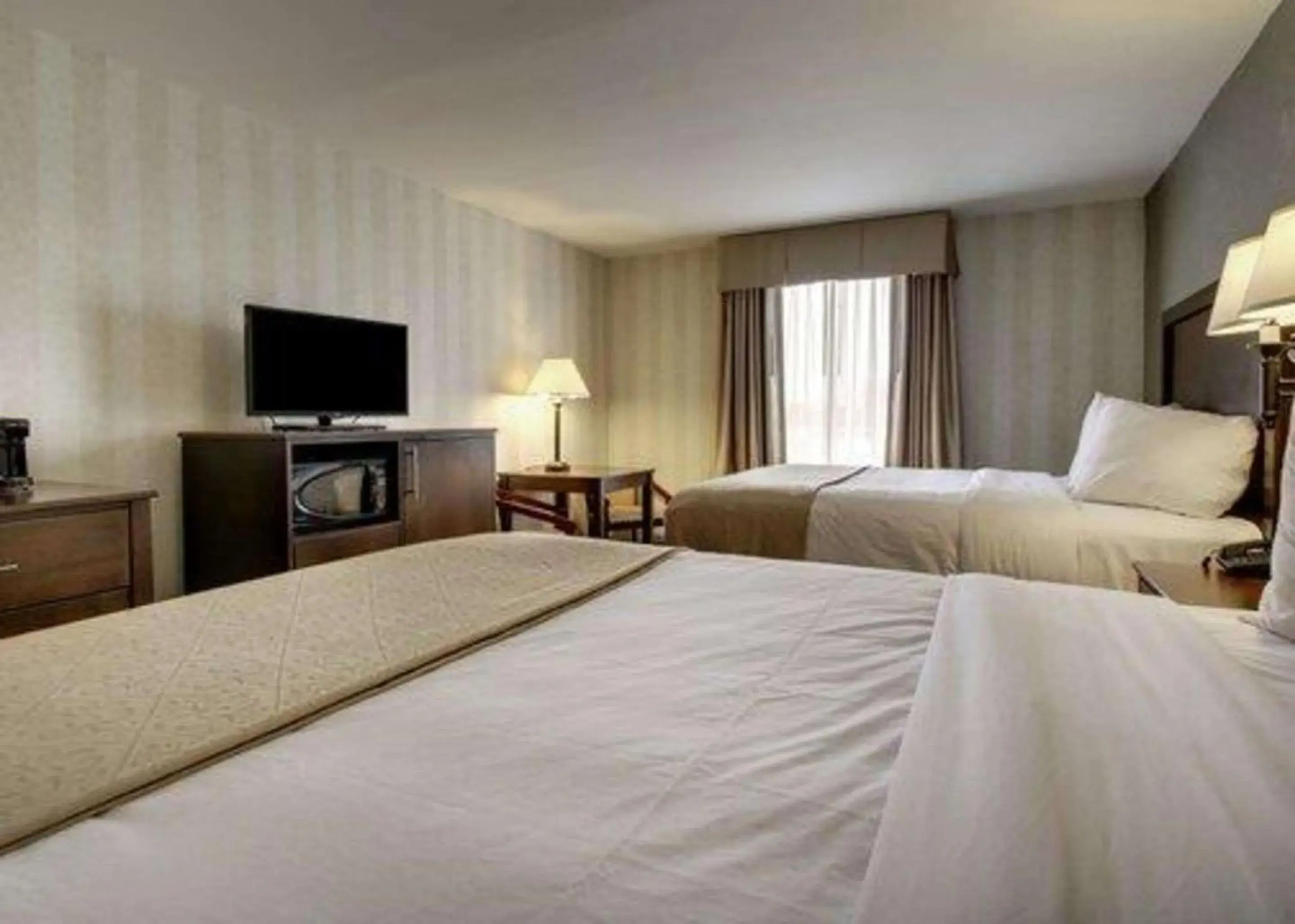 Photo of the whole room, Bed in The Atrium Hotel on Third Photo of the whole room, Bed in The Atrium Hotel on Third