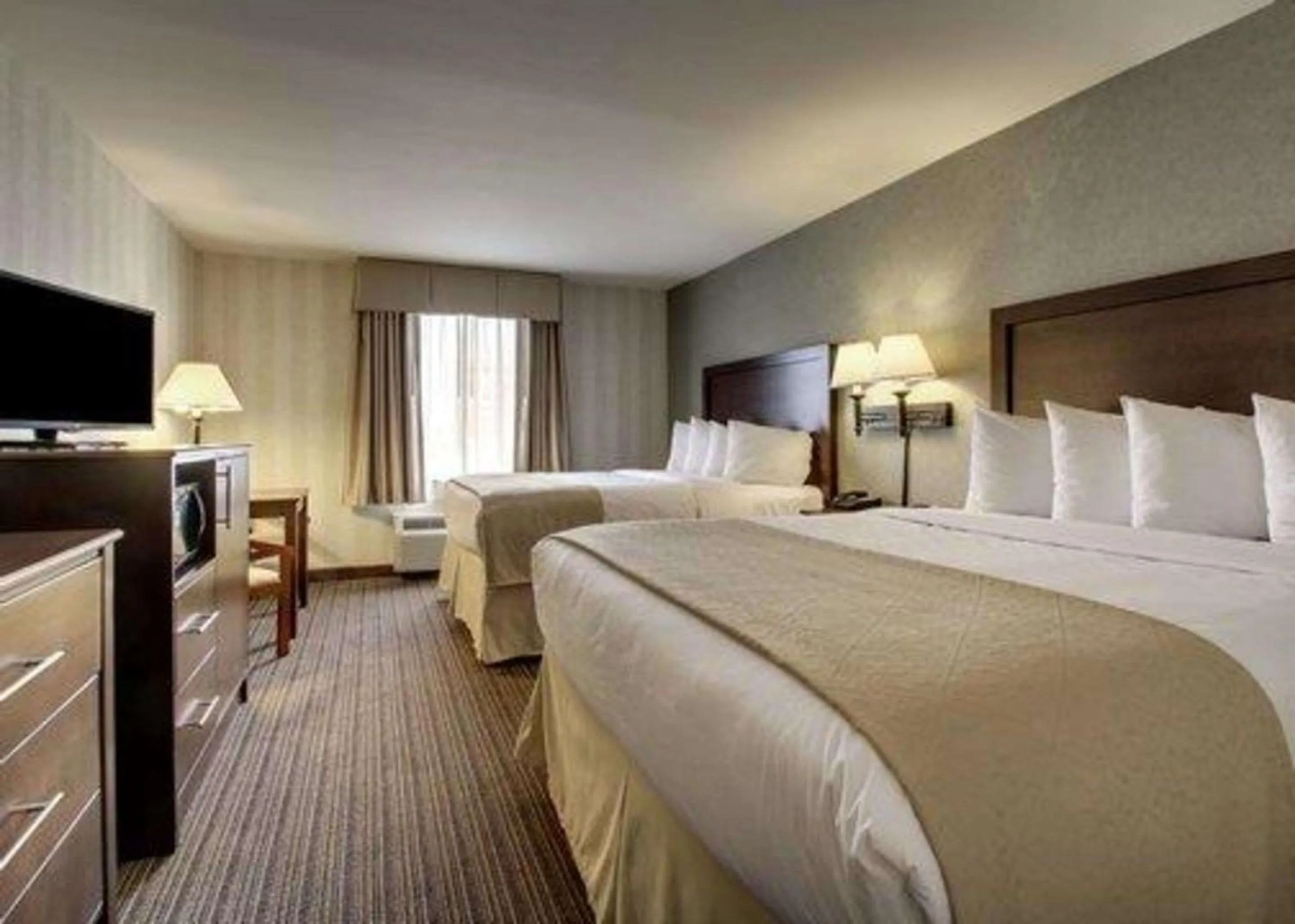 Photo of the whole room, Bed in The Atrium Hotel on Third