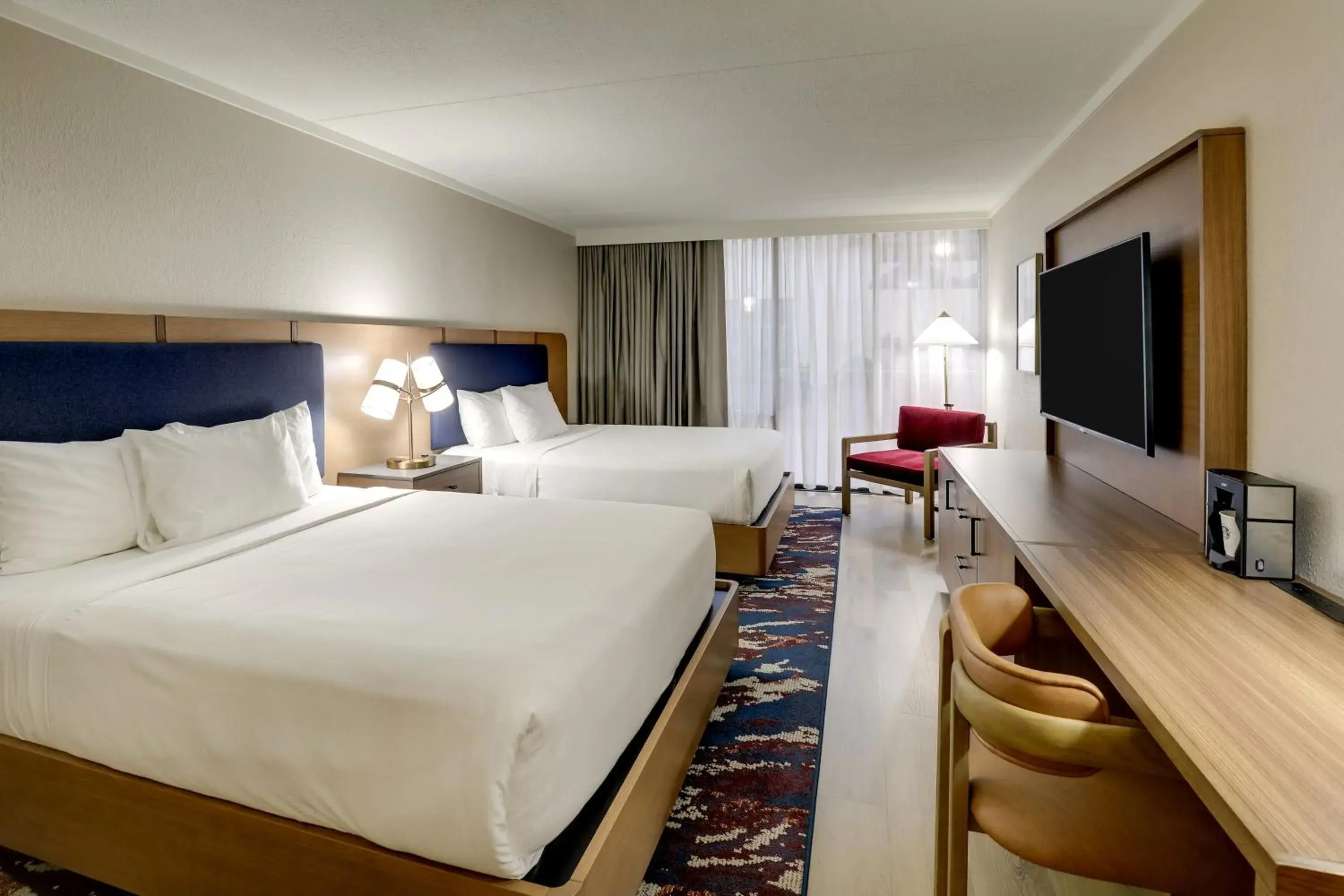 Bed in The Atrium Hotel on Third Bed in The Atrium Hotel on Third