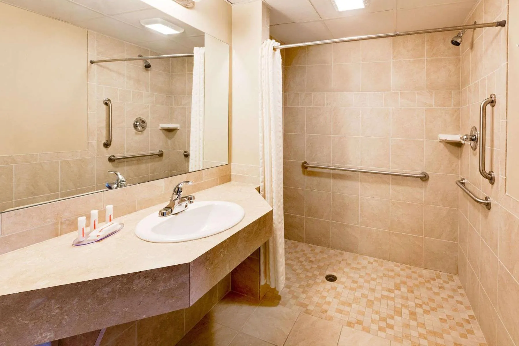 Bathroom in Super 8 by Wyndham Traverse City