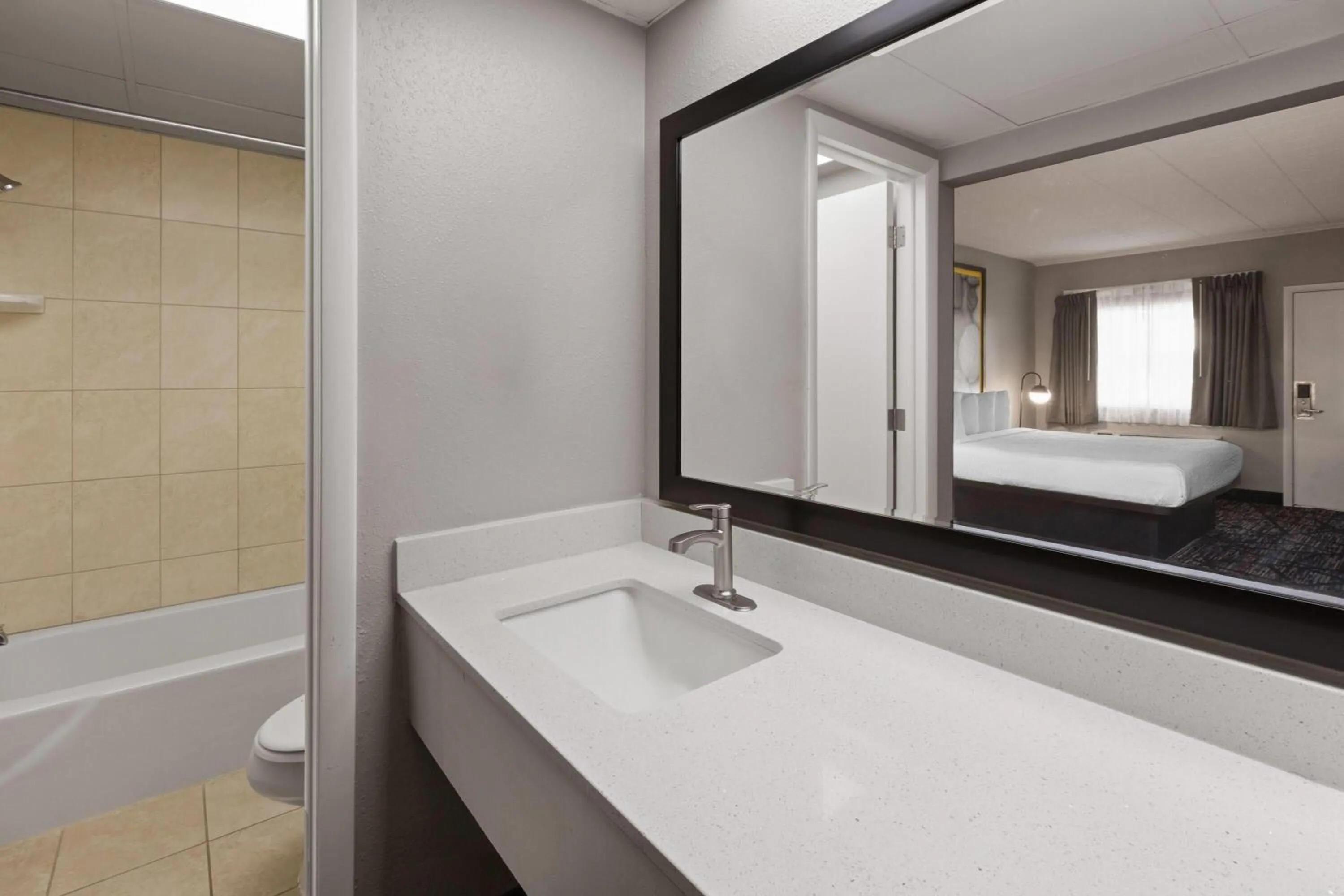 Bathroom in Super 8 by Wyndham Traverse City