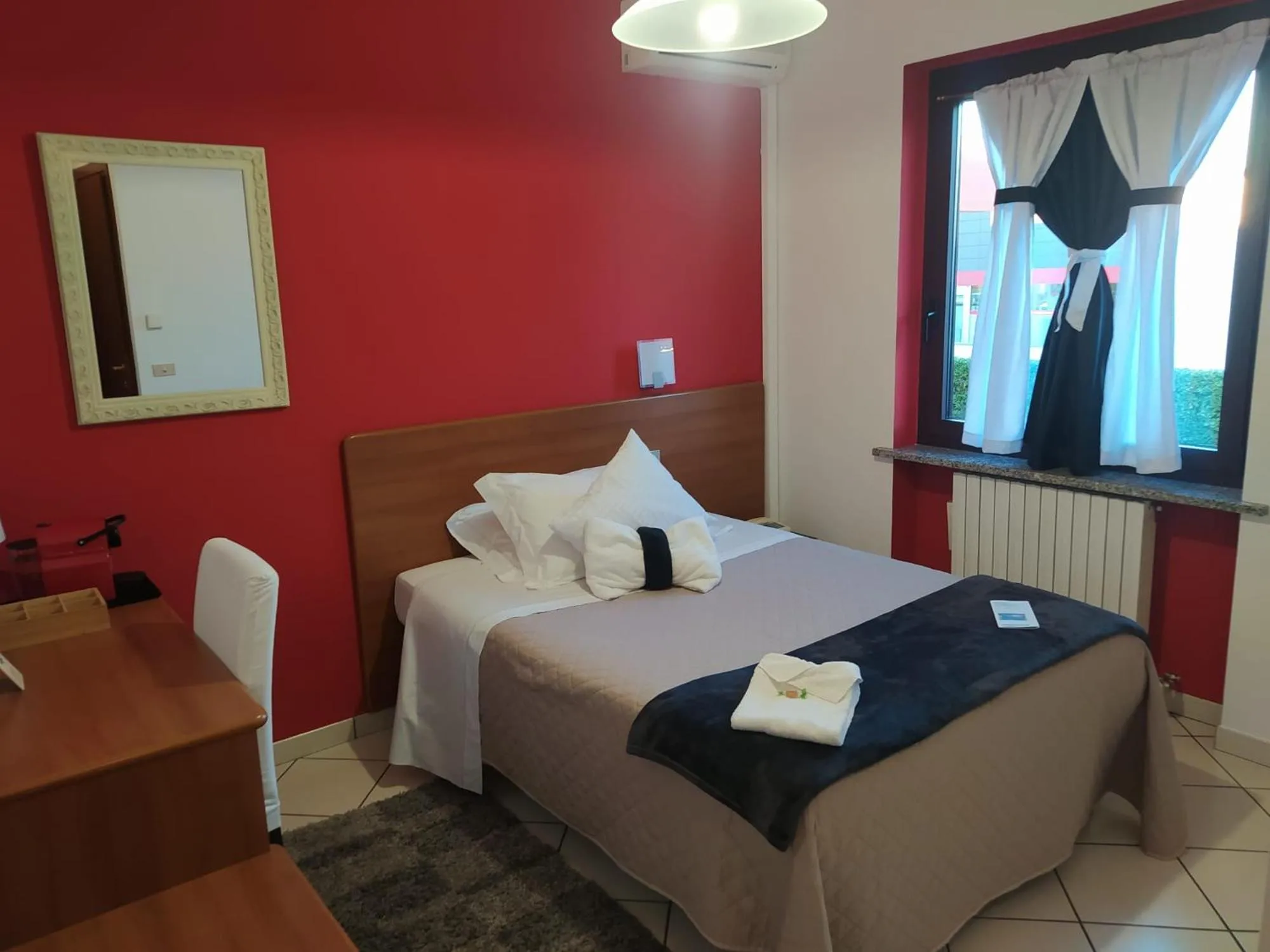 Bed in Hotel Baiardo