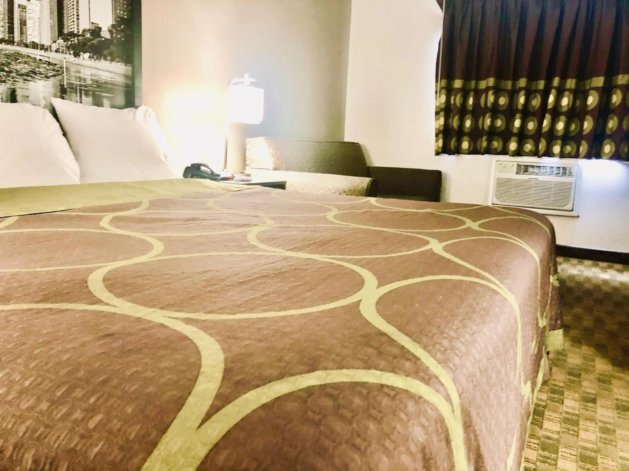 Bed in Super 8 by Wyndham Peru Starved Rock State Park