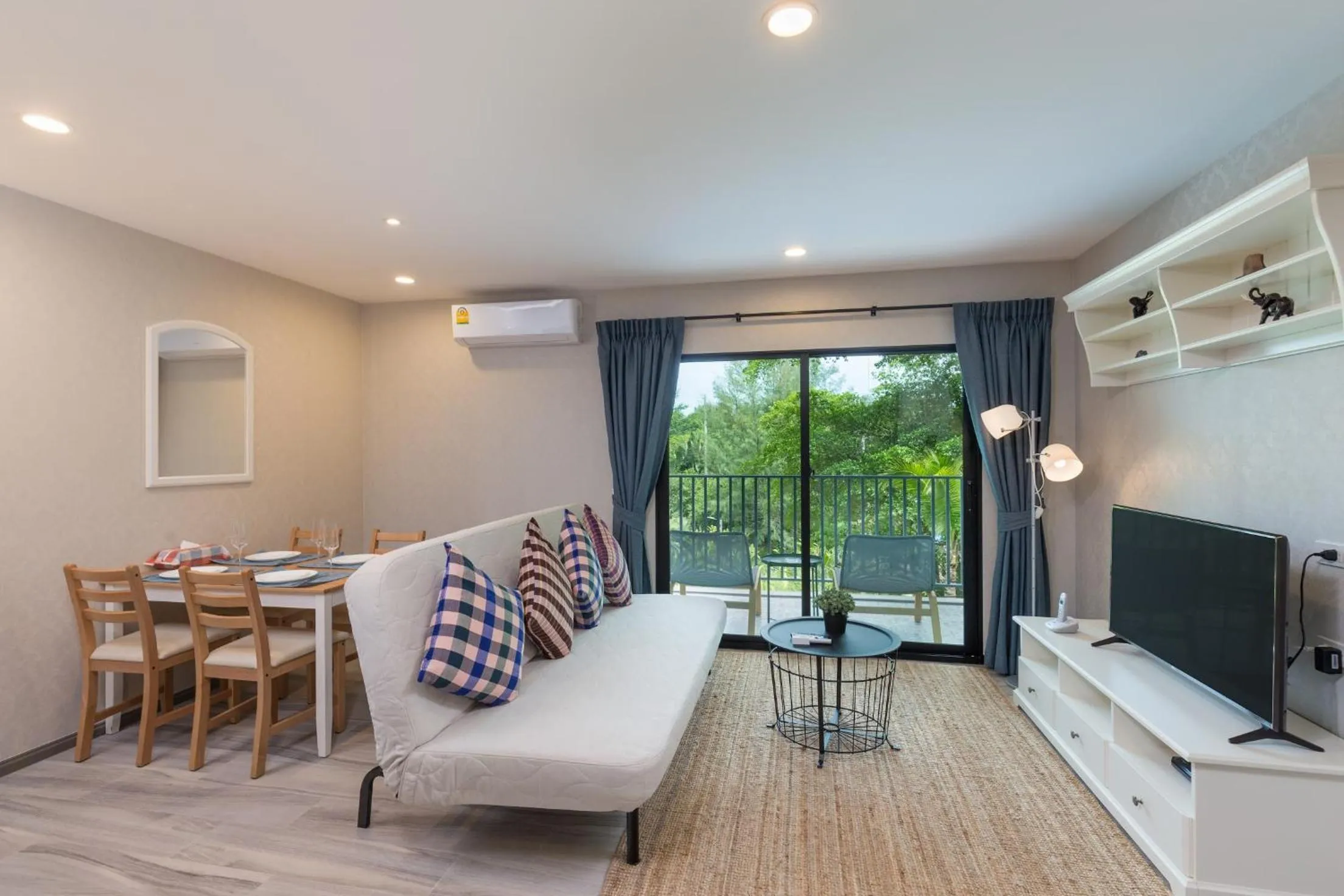 TV and multimedia in NaiYang beach Title Residencies by My Home Phuket