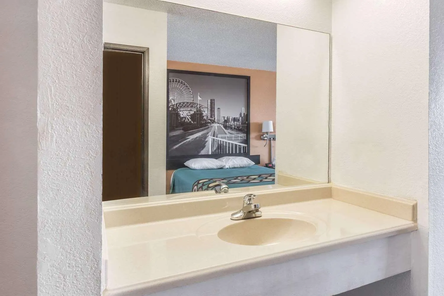 Bathroom in Super 8 by Wyndham Bourbonnais/Kankakee Area