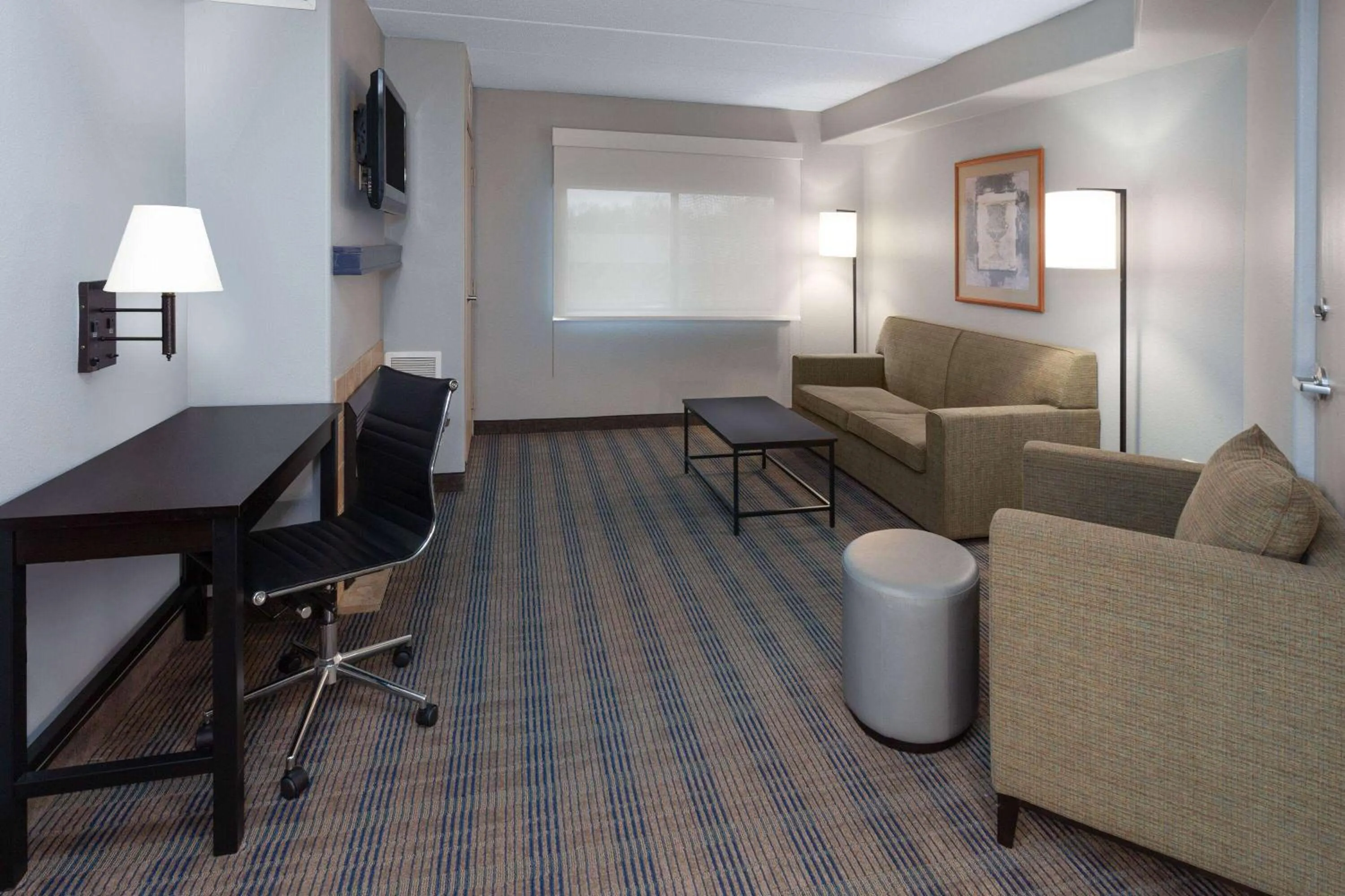 Bed in AmericInn by Wyndham Peoria