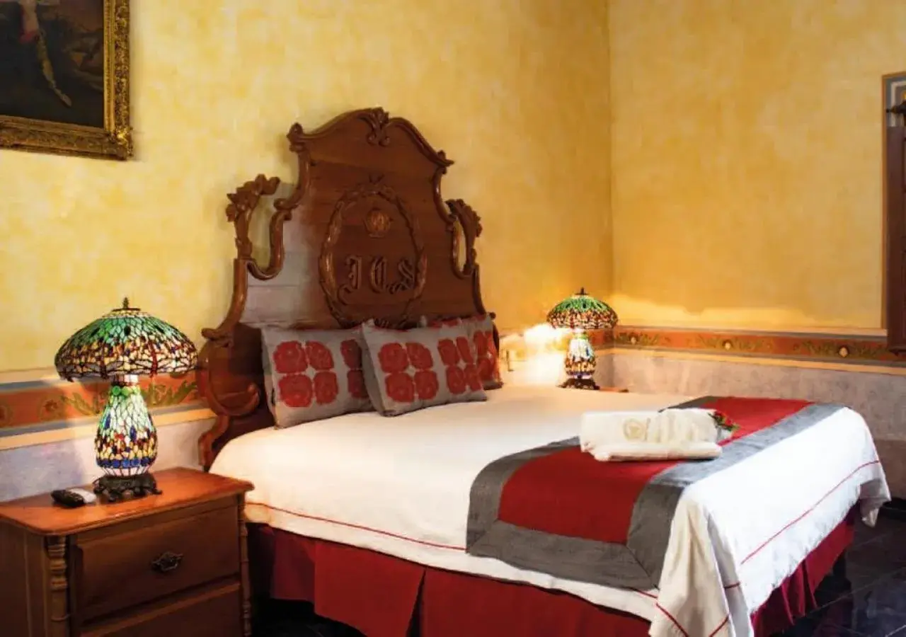 Bed in HOTEL & SPA HACIENDA TRES VIDAS Bed in HOTEL & SPA HACIENDA TRES VIDAS