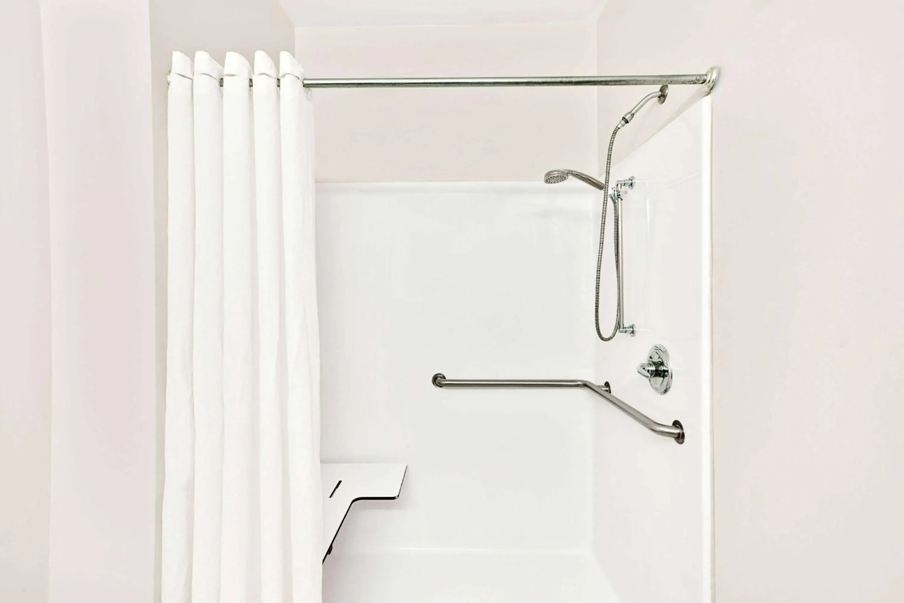 Photo of the whole room in Super 8 by Wyndham Hampshire IL Photo of the whole room in Super 8 by Wyndham Hampshire IL