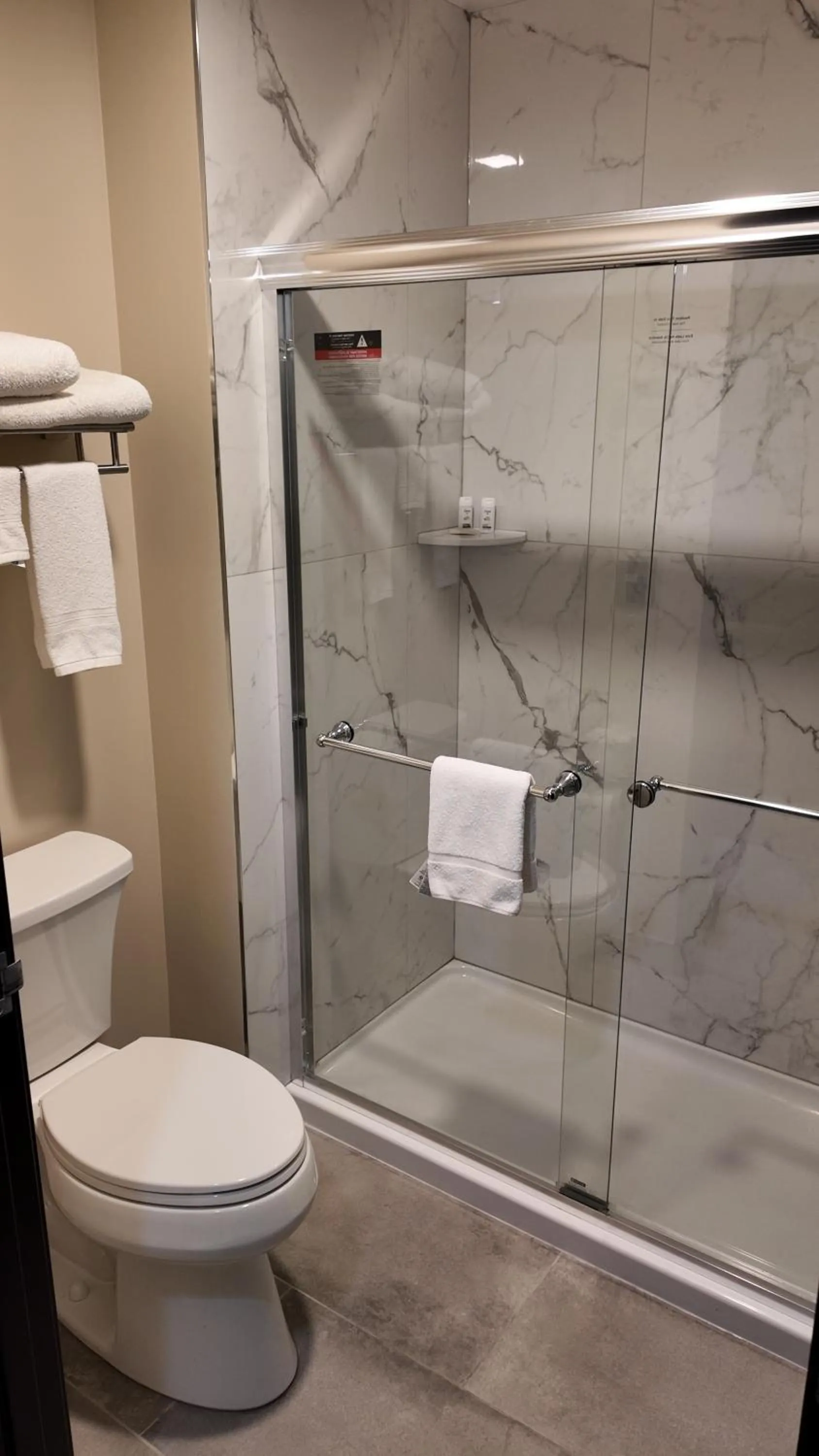 Bathroom in Super 8 by Wyndham Hampshire IL