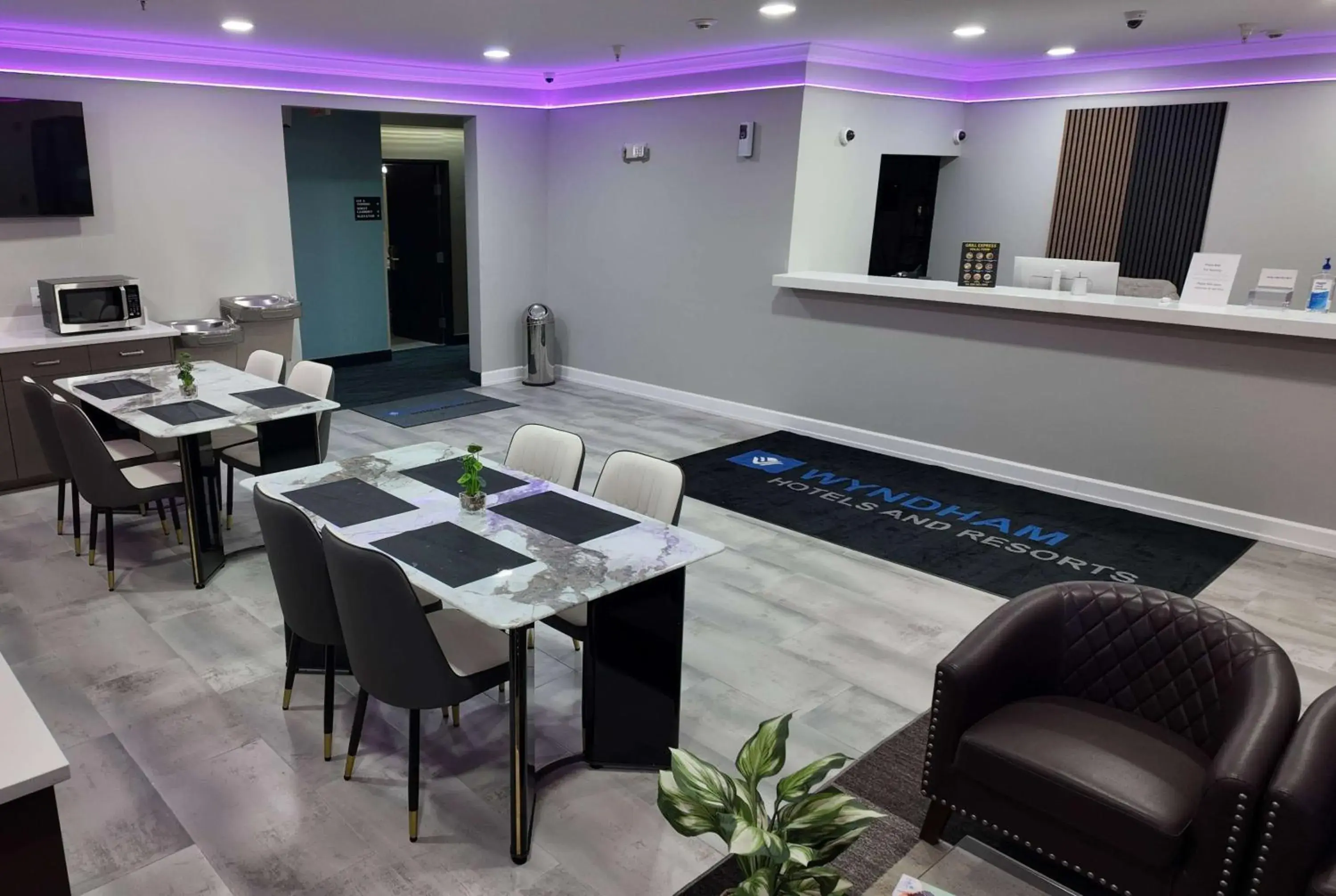 Lobby or reception in Super 8 by Wyndham Hampshire IL Lobby or reception in Super 8 by Wyndham Hampshire IL